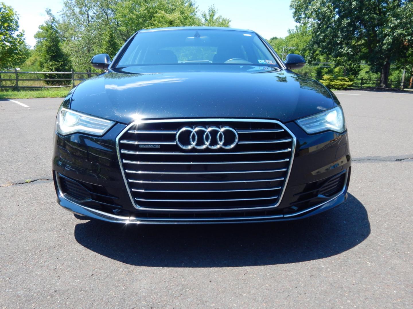 2016 Black /Black Leather Audi A6 Premium Plus (WAUFGAFC7GN) with an 3.0L supercharged v6 engine, Automatic transmission, located at 6528 Lower York Road, New Hope, PA, 18938, (215) 862-9555, 40.358707, -74.977882 - Here we have a beautiful running and driving Audi A6 with a 3.0L supercharged V6 putting power to all four wheels via a smooth shifting automatic transmission. Options include: black leather, keyless entry, wood trim, cruise control, 2 master keys and one valet key, dual power seats, navigation, pus - Photo#6