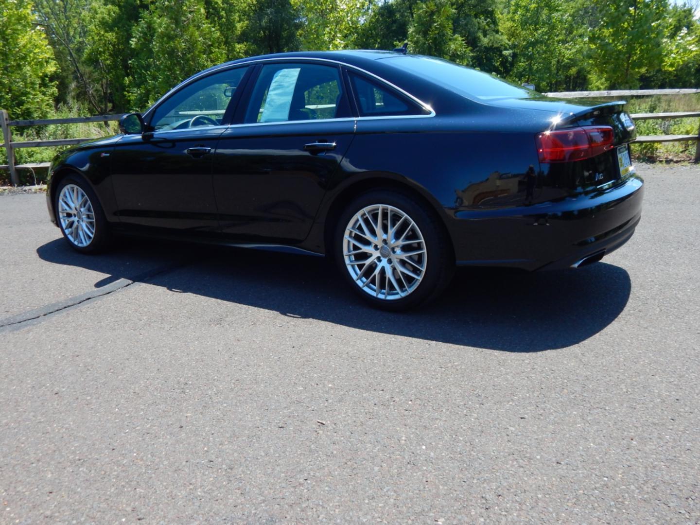 2016 Black /Black Leather Audi A6 Premium Plus (WAUFGAFC7GN) with an 3.0L supercharged v6 engine, Automatic transmission, located at 6528 Lower York Road, New Hope, PA, 18938, (215) 862-9555, 40.358707, -74.977882 - Here we have a beautiful running and driving Audi A6 with a 3.0L supercharged V6 putting power to all four wheels via a smooth shifting automatic transmission. Options include: black leather, keyless entry, wood trim, cruise control, 2 master keys and one valet key, dual power seats, navigation, pus - Photo#2