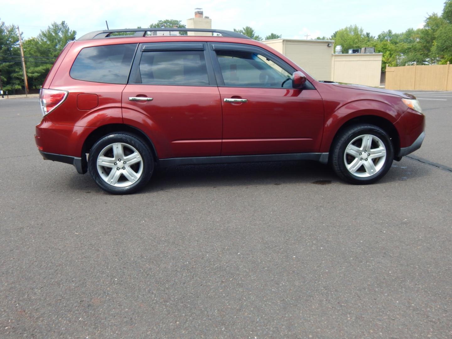 2010 RED /Gray Cloth Subaru Forester Forester (JF2SH6CC1AH) with an 2.5L H4 engine, Automatic transmission, located at 6528 Lower York Road, New Hope, PA, 18938, (215) 862-9555, 40.358707, -74.977882 - Here we have a Subaru Forester with a 2.5L H4 engine putting power to all four wheels via an automatic transmission. Options include: gray cloth, power moving drivers seat, heated front seats, A/C and heat, AM/FM/SAT/CD/AUX radio, cruise control, tilt steering wheel, power windows/locks/mirrors, pow - Photo#4