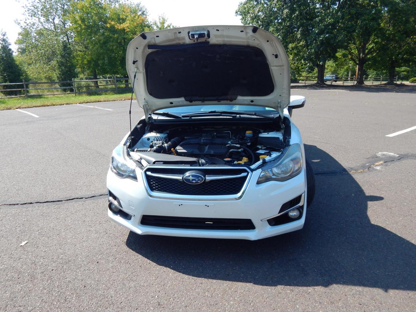 2016 White /Black Cloth Subaru Impreza Sport Premium (JF1GPAP6XG8) with an 2.0L H4 engine, Automatic transmission, located at 6528 Lower York Road, New Hope, PA, 18938, (215) 862-9555, 40.358707, -74.977882 - Here we have a Subaru Impreza with a 2.0L H4 engine putting power to all four wheels via an automatic transmission. Options include: black cloth, AM/FM/CD/BLUETOOTH/AUX/SAT radio, back up camera, tilt steering wheel, heated front seats, cruise control, power windows/locks/mirrors, roof rail, fog lig - Photo#18