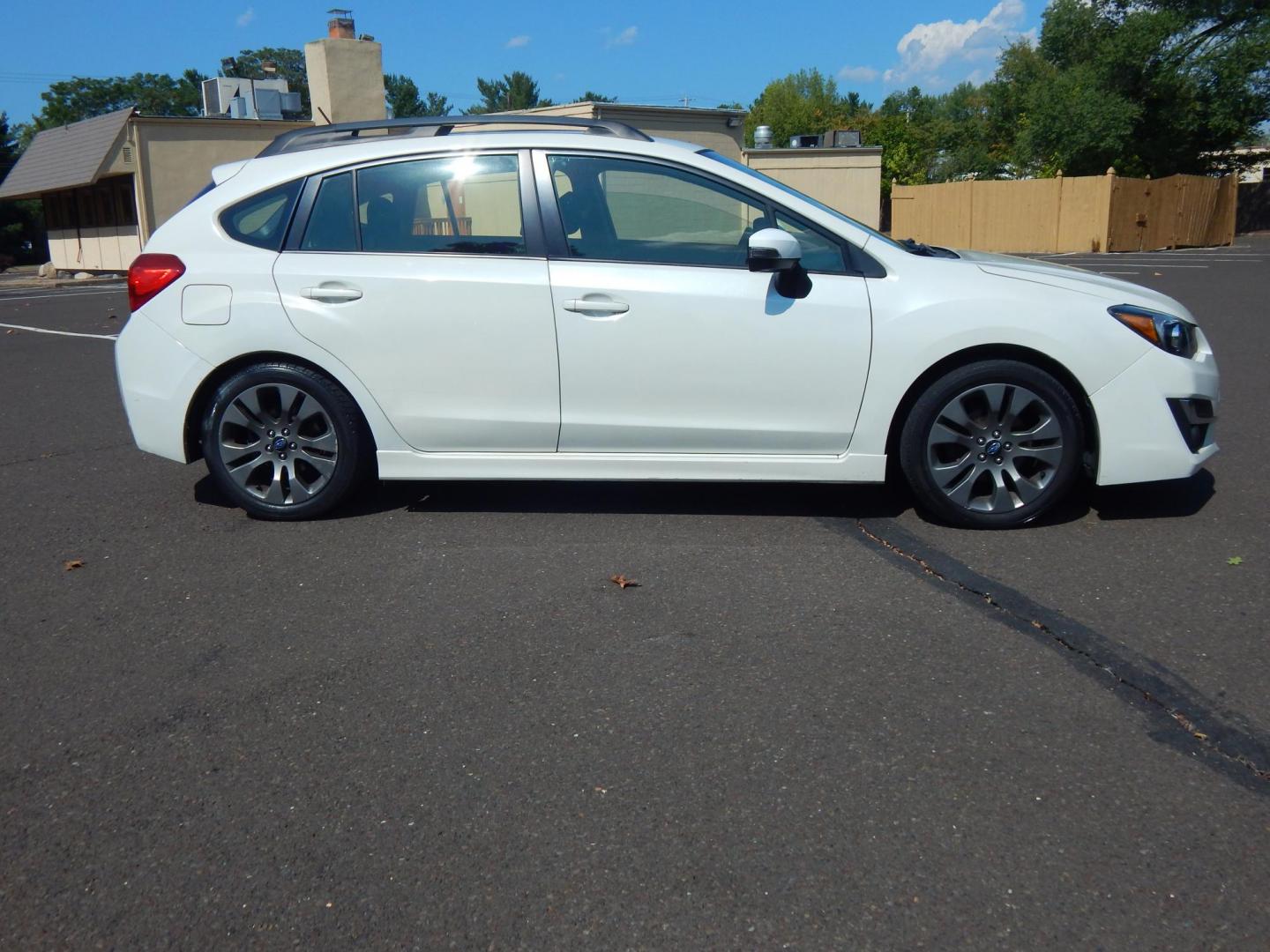 2016 White /Black Cloth Subaru Impreza Sport Premium (JF1GPAP6XG8) with an 2.0L H4 engine, Automatic transmission, located at 6528 Lower York Road, New Hope, PA, 18938, (215) 862-9555, 40.358707, -74.977882 - Here we have a Subaru Impreza with a 2.0L H4 engine putting power to all four wheels via an automatic transmission. Options include: black cloth, AM/FM/CD/BLUETOOTH/AUX/SAT radio, back up camera, tilt steering wheel, heated front seats, cruise control, power windows/locks/mirrors, roof rail, fog lig - Photo#4