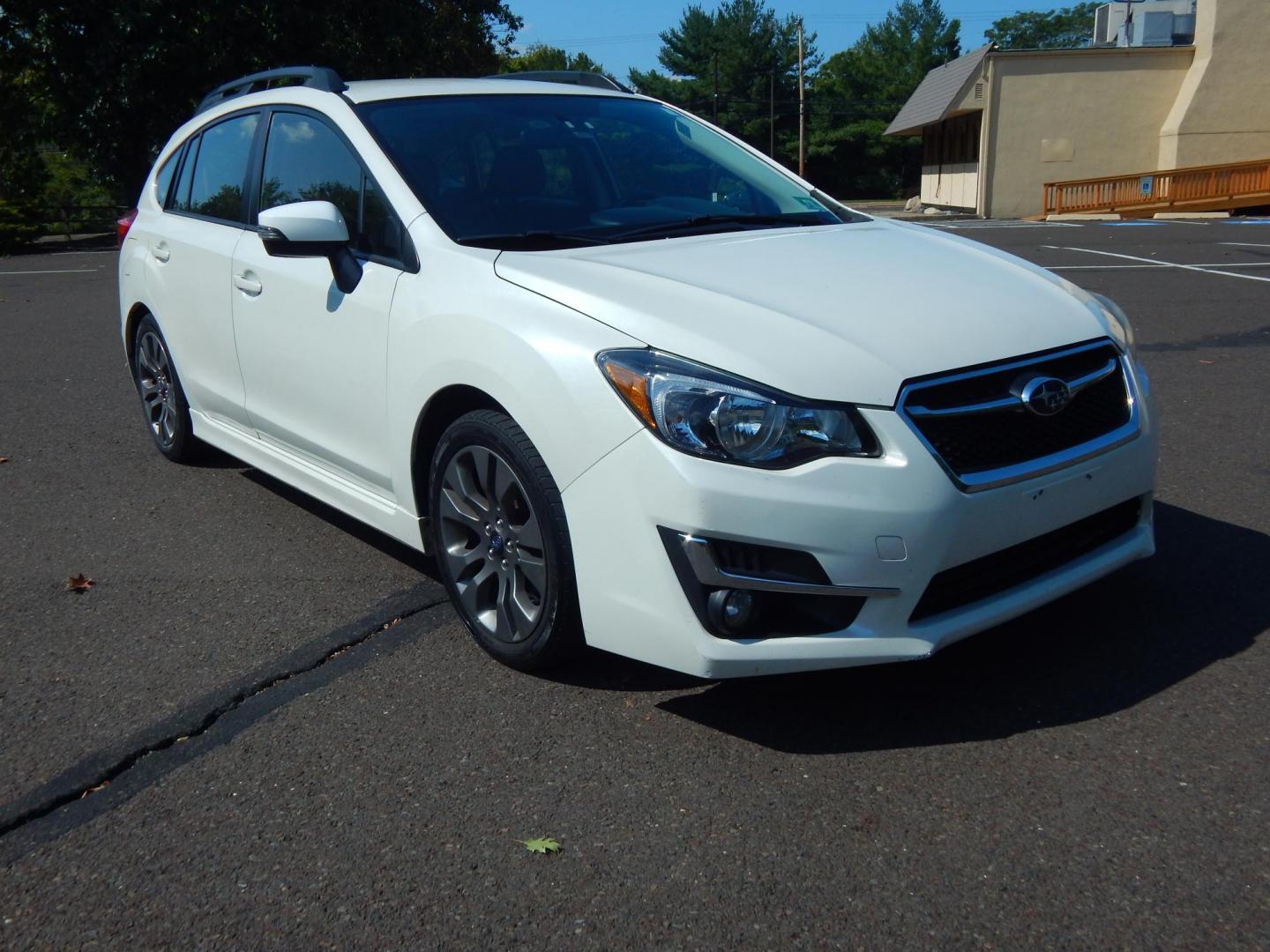 2016 White /Black Cloth Subaru Impreza Sport Premium (JF1GPAP6XG8) with an 2.0L H4 engine, Automatic transmission, located at 6528 Lower York Road, New Hope, PA, 18938, (215) 862-9555, 40.358707, -74.977882 - Here we have a Subaru Impreza with a 2.0L H4 engine putting power to all four wheels via an automatic transmission. Options include: black cloth, AM/FM/CD/BLUETOOTH/AUX/SAT radio, back up camera, tilt steering wheel, heated front seats, cruise control, power windows/locks/mirrors, roof rail, fog lig - Photo#3