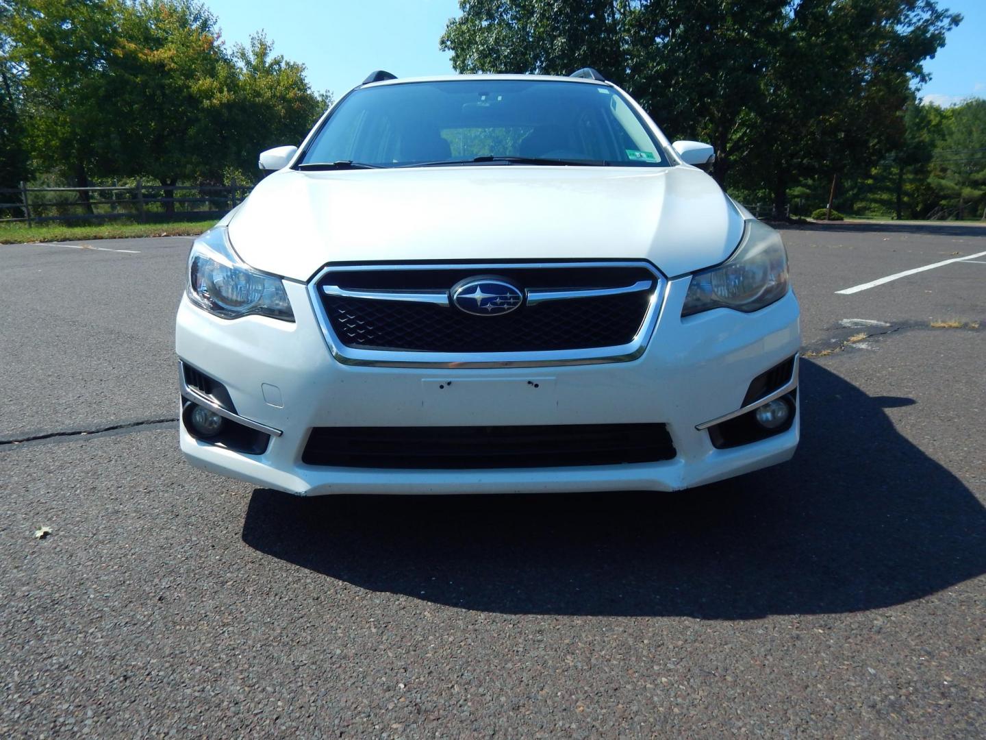 2016 White /Black Cloth Subaru Impreza Sport Premium (JF1GPAP6XG8) with an 2.0L H4 engine, Automatic transmission, located at 6528 Lower York Road, New Hope, PA, 18938, (215) 862-9555, 40.358707, -74.977882 - Here we have a Subaru Impreza with a 2.0L H4 engine putting power to all four wheels via an automatic transmission. Options include: black cloth, AM/FM/CD/BLUETOOTH/AUX/SAT radio, back up camera, tilt steering wheel, heated front seats, cruise control, power windows/locks/mirrors, roof rail, fog lig - Photo#6