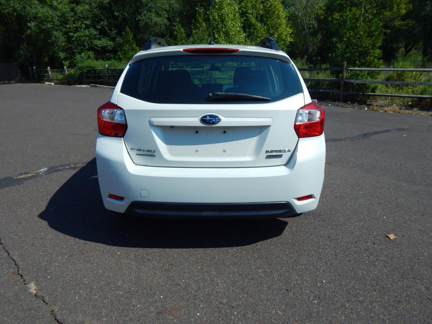 2016 White /Black Cloth Subaru Impreza Sport Premium (JF1GPAP6XG8) with an 2.0L H4 engine, Automatic transmission, located at 6528 Lower York Road, New Hope, PA, 18938, (215) 862-9555, 40.358707, -74.977882 - Here we have a Subaru Impreza with a 2.0L H4 engine putting power to all four wheels via an automatic transmission. Options include: black cloth, AM/FM/CD/BLUETOOTH/AUX/SAT radio, back up camera, tilt steering wheel, heated front seats, cruise control, power windows/locks/mirrors, roof rail, fog lig - Photo#8