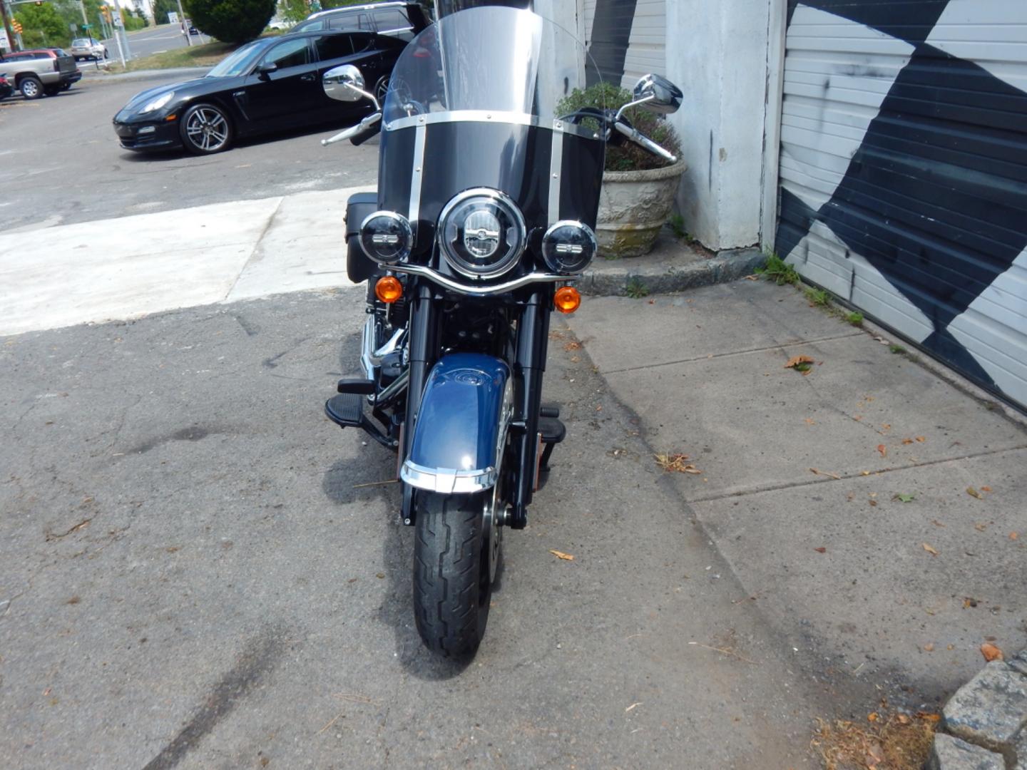 2019 Blue/White Harley-Davidson Heritage Softail (1HD1YBK10KC) with an 114 engine, Manual transmission, located at 6528 Lower York Road, New Hope, PA, 18938, (215) 862-9555, 40.358707, -74.977882 - Here we have a beautiful running and riding Heritage Softail with a 114 Cubic Inch engine. This bike comes with saddle bags, wind screen, ABS, keyless start, black leather seat and Xenon lights. The right side of the gas tank has some paint touch up work done. This is a ONE OWNER bike with no accide - Photo#2