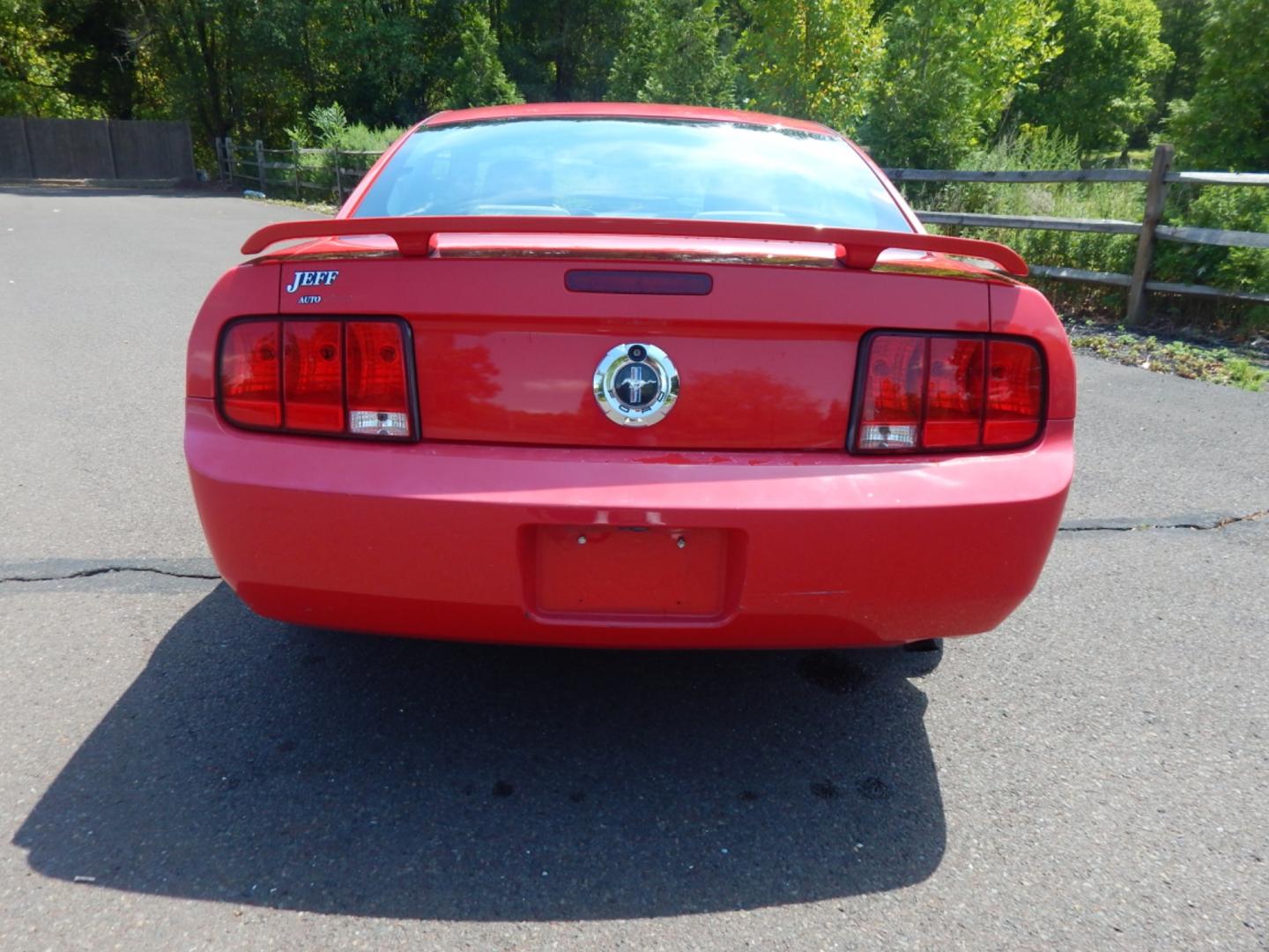 2006 RED /Black Cloth Ford Mustang V6 Deluxe Coupe (1ZVFT80N965) with an 4.0L V6 SOHC 12V engine, Automatic transmission, located at 6528 Lower York Road, New Hope, PA, 18938, (215) 862-9555, 40.358707, -74.977882 - Here we have a 2006 Ford Mustang with a 4.0L V6 putting power to the rear wheels via a smooth shifting automatic transmission. Options include: black cloth, AM/FM/CD/AUX radio, cruise control, tilt steering wheel, power windows/locks/mirrors, power sliding drivers seat, moonroof, rear spoiler and 17 - Photo#7