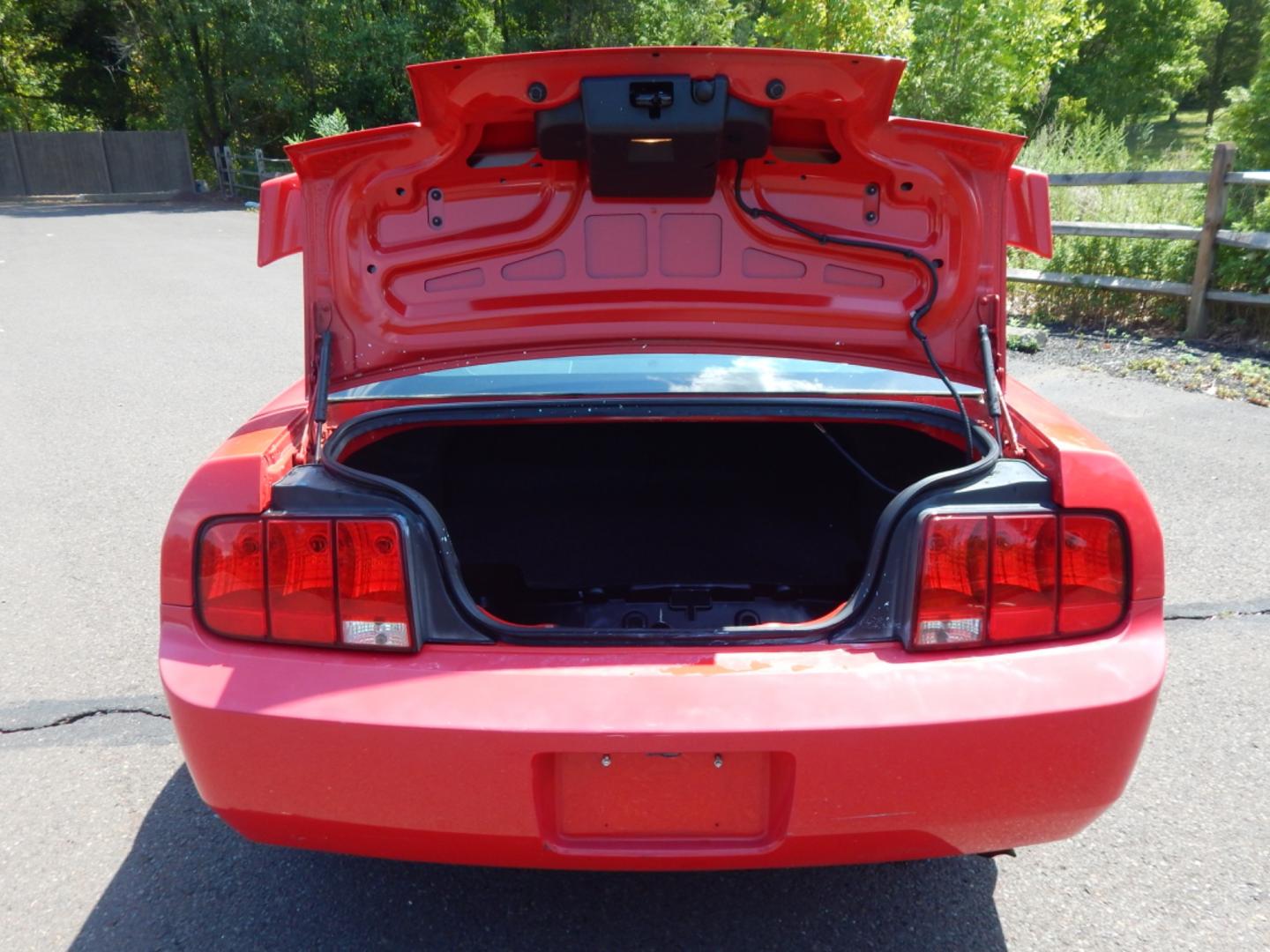 2006 RED /Black Cloth Ford Mustang V6 Deluxe Coupe (1ZVFT80N965) with an 4.0L V6 SOHC 12V engine, Automatic transmission, located at 6528 Lower York Road, New Hope, PA, 18938, (215) 862-9555, 40.358707, -74.977882 - Here we have a 2006 Ford Mustang with a 4.0L V6 putting power to the rear wheels via a smooth shifting automatic transmission. Options include: black cloth, AM/FM/CD/AUX radio, cruise control, tilt steering wheel, power windows/locks/mirrors, power sliding drivers seat, moonroof, rear spoiler and 17 - Photo#8