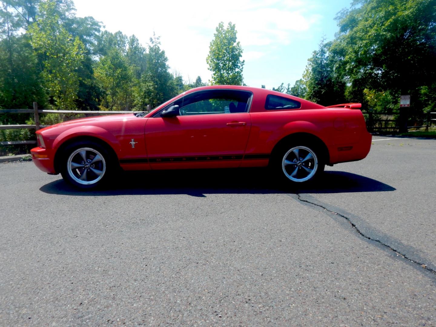 2006 RED /Black Cloth Ford Mustang V6 Deluxe Coupe (1ZVFT80N965) with an 4.0L V6 SOHC 12V engine, Automatic transmission, located at 6528 Lower York Road, New Hope, PA, 18938, (215) 862-9555, 40.358707, -74.977882 - Here we have a 2006 Ford Mustang with a 4.0L V6 putting power to the rear wheels via a smooth shifting automatic transmission. Options include: black cloth, AM/FM/CD/AUX radio, cruise control, tilt steering wheel, power windows/locks/mirrors, power sliding drivers seat, moonroof, rear spoiler and 17 - Photo#1