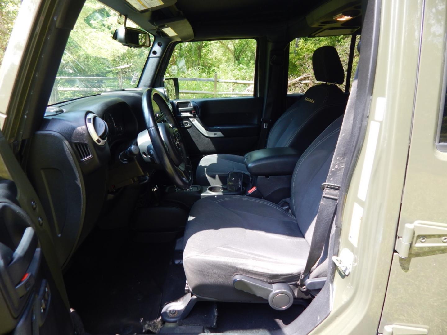 2016 Green /Black Cloth Jeep Wrangler (1C4HJWEG7GL) with an 3.6L V6 engine, Automatic transmission, located at 6528 Lower York Road, New Hope, PA, 18938, (215) 862-9555, 40.358707, -74.977882 - Here we have a Jeep Wrangler with a 3.6L V6 putting power to a 4x4 automatic transmission. Options include: black cloth, power windows/locks/mirrors, new soft top, tilt steering wheel, cruise control, a/c-heat, AM/FM/CD/SAT/DISC RADIO, fog lights and 18 inch alloy wheels wrapped in Goodyear Wrangler - Photo#8