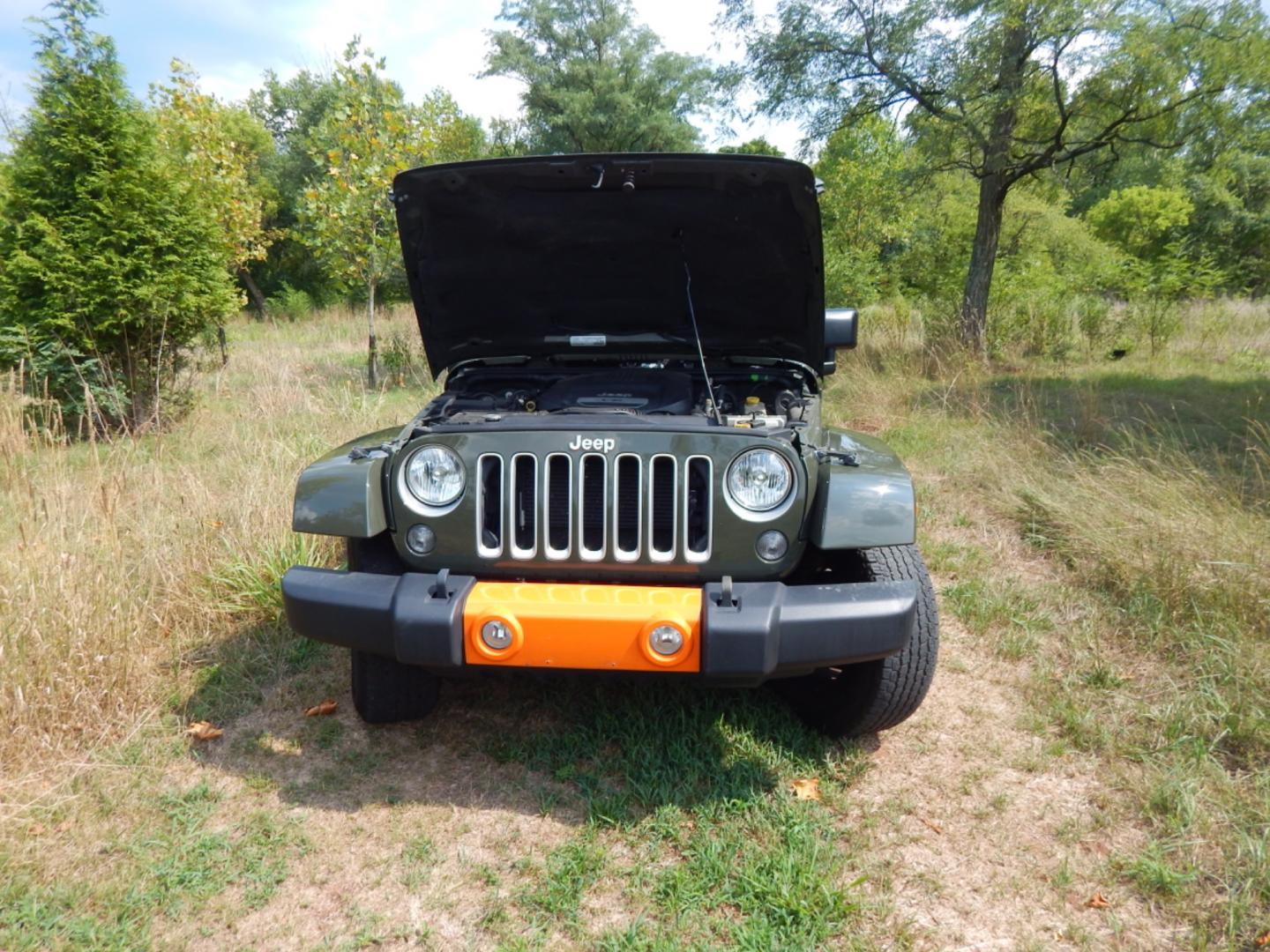 2016 Green /Black Cloth Jeep Wrangler (1C4HJWEG7GL) with an 3.6L V6 engine, Automatic transmission, located at 6528 Lower York Road, New Hope, PA, 18938, (215) 862-9555, 40.358707, -74.977882 - Here we have a Jeep Wrangler with a 3.6L V6 putting power to a 4x4 automatic transmission. Options include: black cloth, power windows/locks/mirrors, new soft top, tilt steering wheel, cruise control, a/c-heat, AM/FM/CD/SAT/DISC RADIO, fog lights and 18 inch alloy wheels wrapped in Goodyear Wrangler - Photo#21