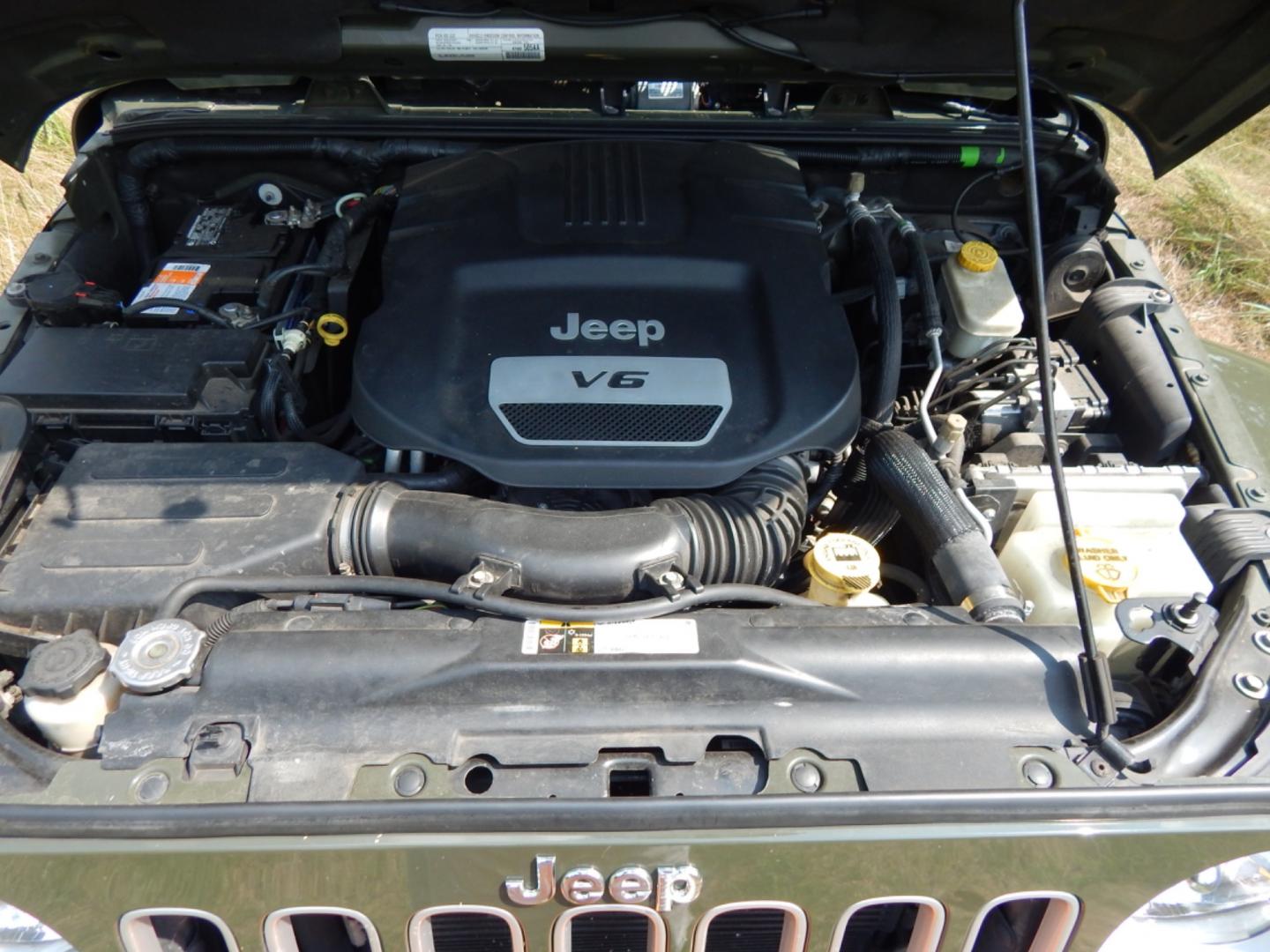 2016 Green /Black Cloth Jeep Wrangler (1C4HJWEG7GL) with an 3.6L V6 engine, Automatic transmission, located at 6528 Lower York Road, New Hope, PA, 18938, (215) 862-9555, 40.358707, -74.977882 - Here we have a Jeep Wrangler with a 3.6L V6 putting power to a 4x4 automatic transmission. Options include: black cloth, power windows/locks/mirrors, new soft top, tilt steering wheel, cruise control, a/c-heat, AM/FM/CD/SAT/DISC RADIO, fog lights and 18 inch alloy wheels wrapped in Goodyear Wrangler - Photo#20