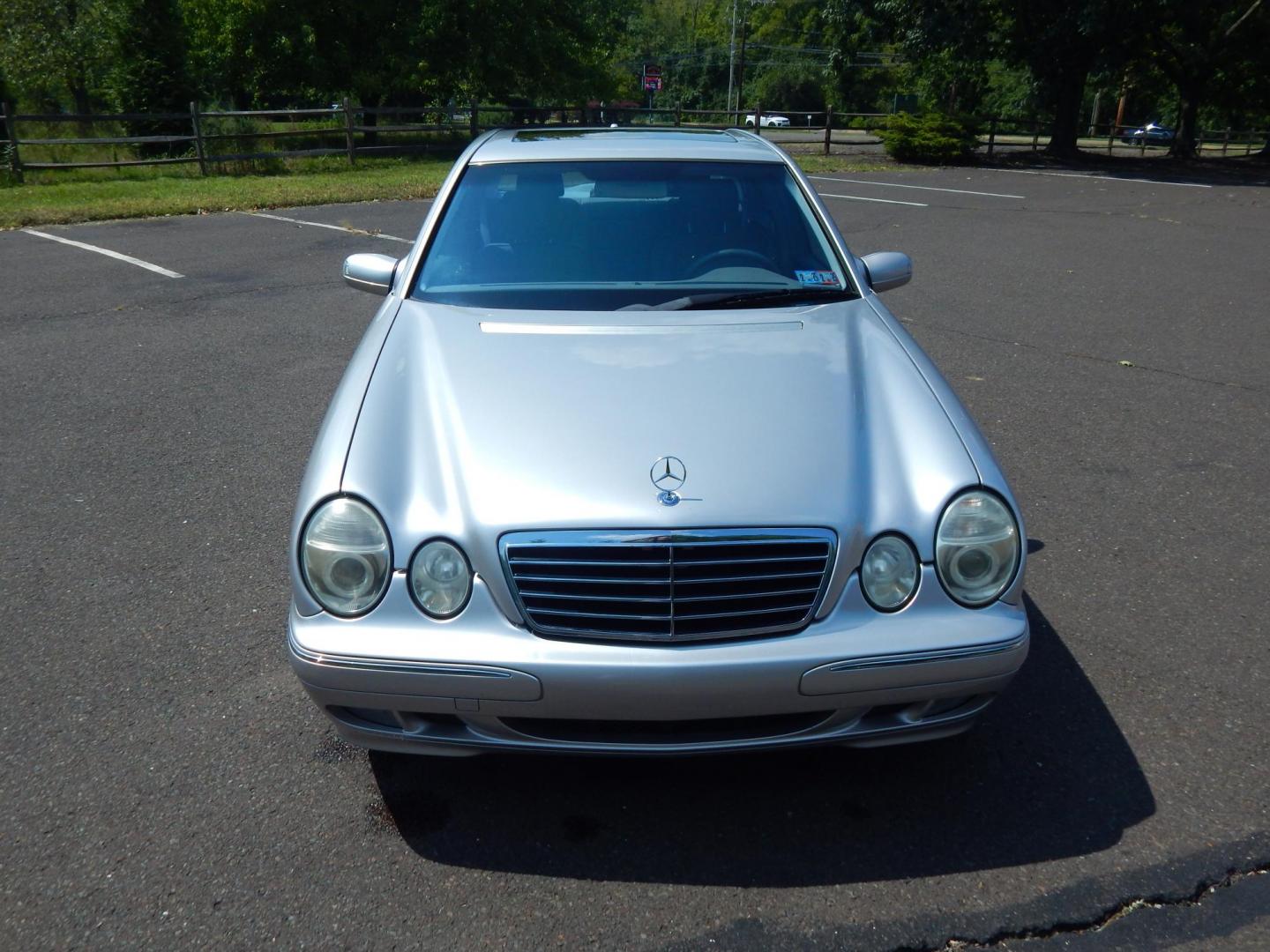 2002 Silver /Gray Leather Mercedes-Benz E-Class E320 (WDBJF65J22B) with an 3.2L V6 SOHC 18V engine, 5-Speed Automatic Overdrive transmission, located at 6528 Lower York Road, New Hope, PA, 18938, (215) 862-9555, 40.358707, -74.977882 - Here we have a beautiful 2002 E320 with a 3.2L V6 putting power to the rear wheels via a smooth shifting automatic transmission. Options include: gray leather, birds eye maple wood trim, dual power seats, dual memory seats, power windows/locks/mirrors, AM/FM/CD/TAPE radio, sunroof, dual climate cont - Photo#8