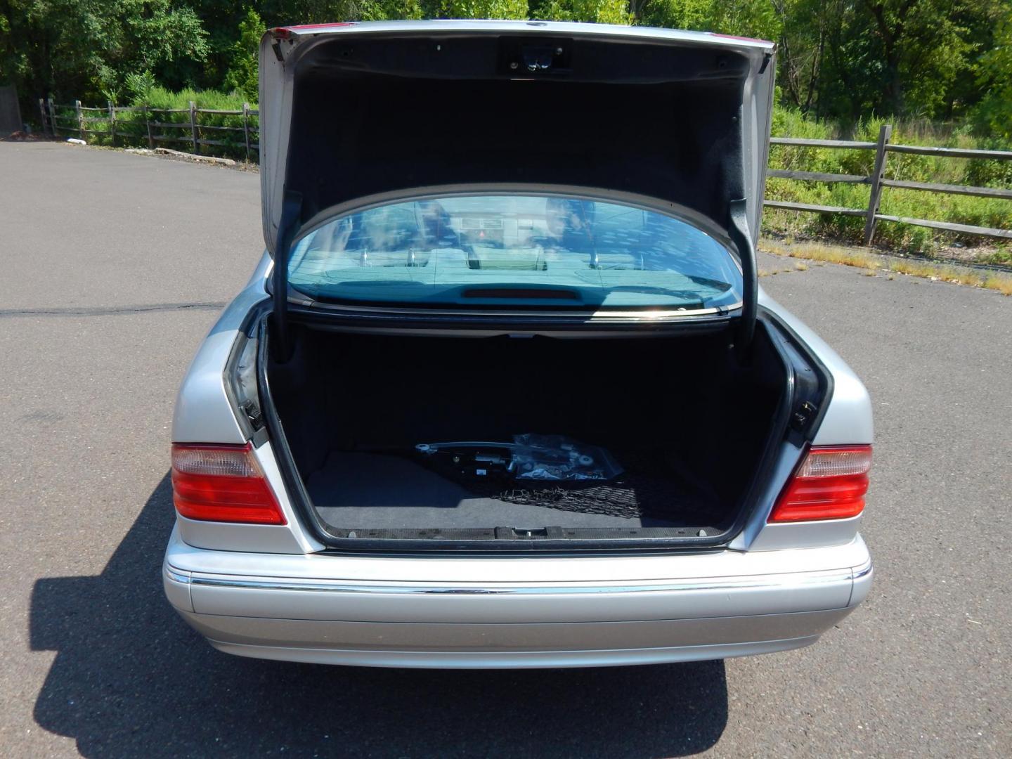 2002 Silver /Gray Leather Mercedes-Benz E-Class E320 (WDBJF65J22B) with an 3.2L V6 SOHC 18V engine, 5-Speed Automatic Overdrive transmission, located at 6528 Lower York Road, New Hope, PA, 18938, (215) 862-9555, 40.358707, -74.977882 - Here we have a beautiful 2002 E320 with a 3.2L V6 putting power to the rear wheels via a smooth shifting automatic transmission. Options include: gray leather, birds eye maple wood trim, dual power seats, dual memory seats, power windows/locks/mirrors, AM/FM/CD/TAPE radio, sunroof, dual climate cont - Photo#9