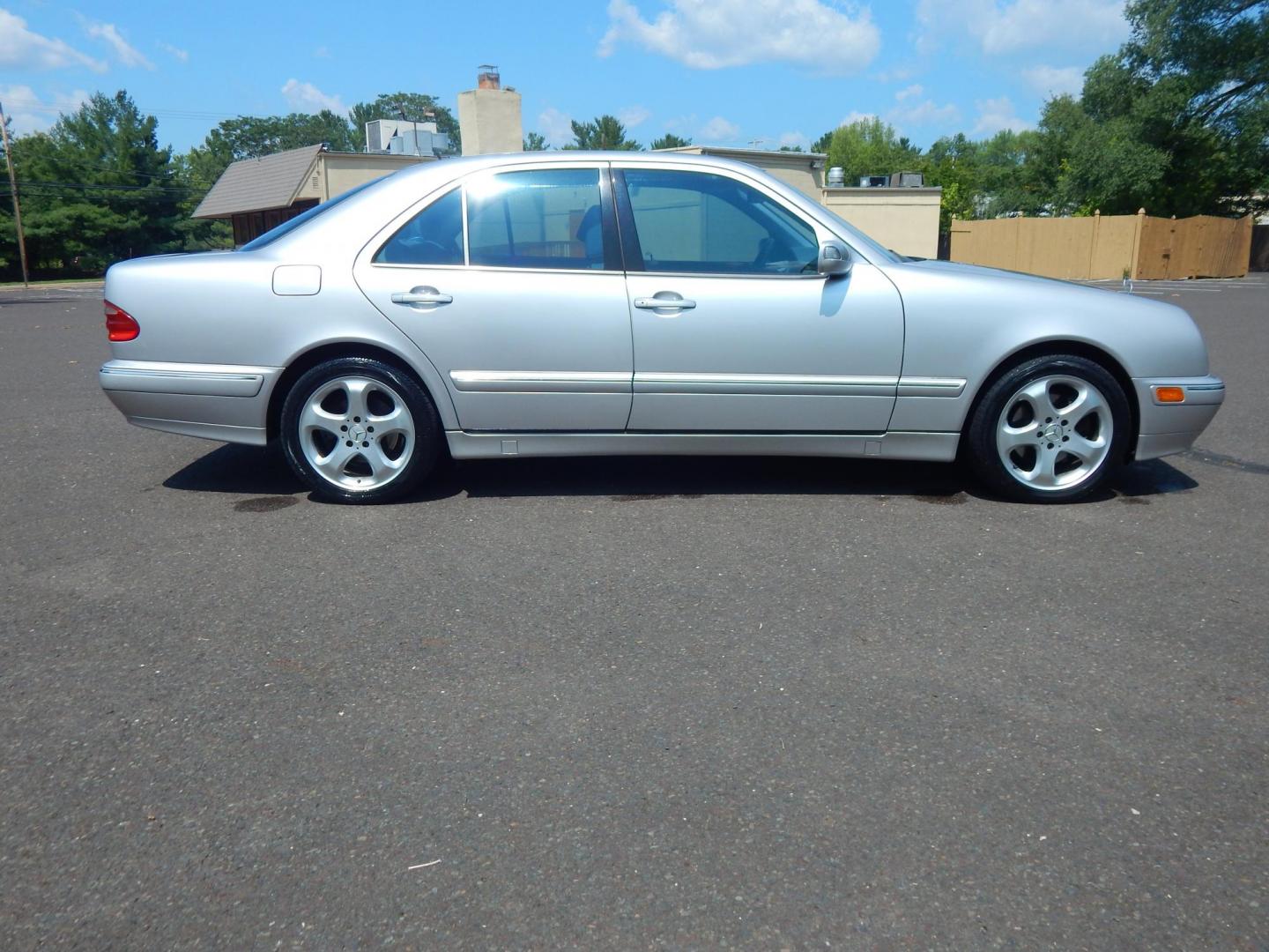 2002 Silver /Gray Leather Mercedes-Benz E-Class E320 (WDBJF65J22B) with an 3.2L V6 SOHC 18V engine, 5-Speed Automatic Overdrive transmission, located at 6528 Lower York Road, New Hope, PA, 18938, (215) 862-9555, 40.358707, -74.977882 - Here we have a beautiful 2002 E320 with a 3.2L V6 putting power to the rear wheels via a smooth shifting automatic transmission. Options include: gray leather, birds eye maple wood trim, dual power seats, dual memory seats, power windows/locks/mirrors, AM/FM/CD/TAPE radio, sunroof, dual climate cont - Photo#4