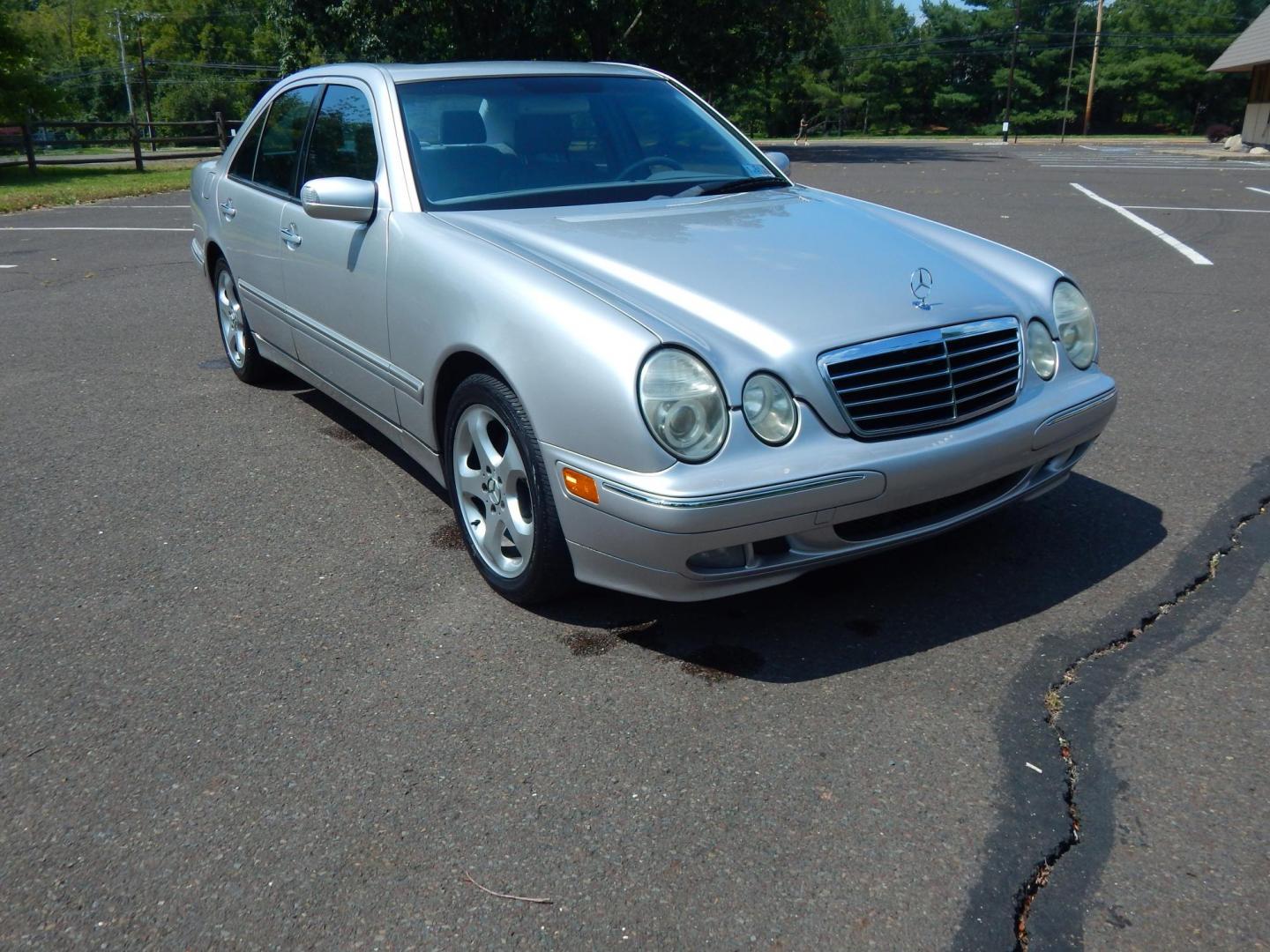 2002 Silver /Gray Leather Mercedes-Benz E-Class E320 (WDBJF65J22B) with an 3.2L V6 SOHC 18V engine, 5-Speed Automatic Overdrive transmission, located at 6528 Lower York Road, New Hope, PA, 18938, (215) 862-9555, 40.358707, -74.977882 - Here we have a beautiful 2002 E320 with a 3.2L V6 putting power to the rear wheels via a smooth shifting automatic transmission. Options include: gray leather, birds eye maple wood trim, dual power seats, dual memory seats, power windows/locks/mirrors, AM/FM/CD/TAPE radio, sunroof, dual climate cont - Photo#6