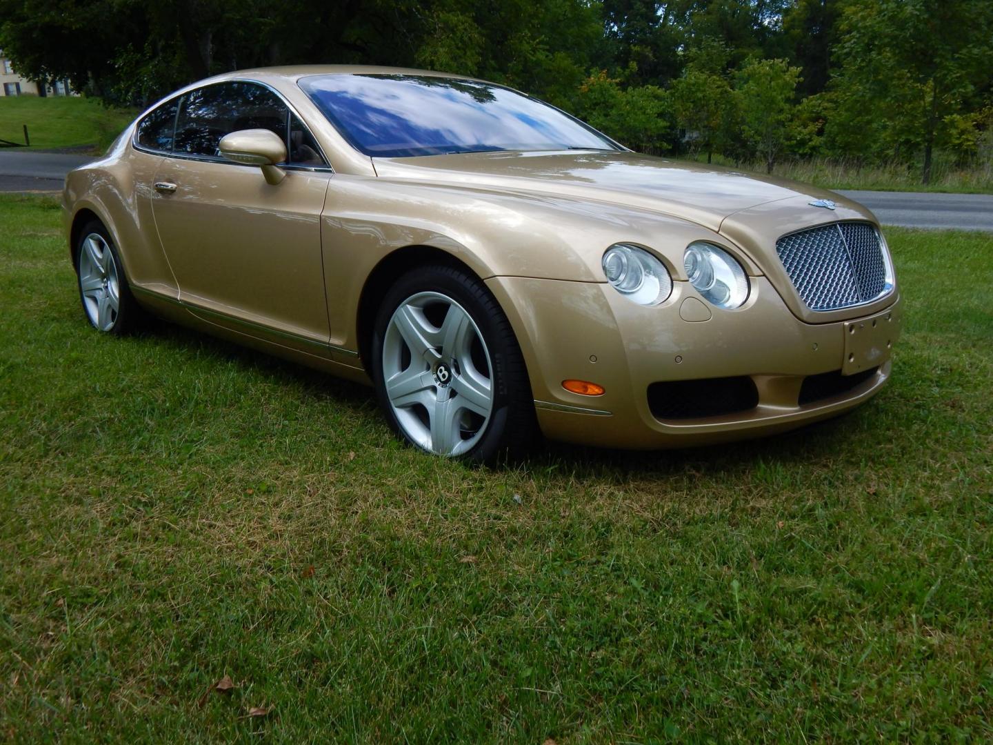 2005 Gold /Saddle Leather Bentley Continental GT Coupe (SCBCR63W25C) with an 6.0L W12 DOHC 48V TURBO engine, 6-Speed Automatic Overdrive transmission, located at 6528 Lower York Road, New Hope, PA, 18938, (215) 862-9555, 40.358707, -74.977882 - Here for sale is a very clean 3 owner 2005 Bentley Continental GT.....Gold paint with Saddle leather interior, All Wheel Drive is powered by a 6.0 Liter W 12 twin turbo engine, automatic or self shift transmission, dual, heated power front seats, tilt wheel, cruise control, dual climate control, bea - Photo#3