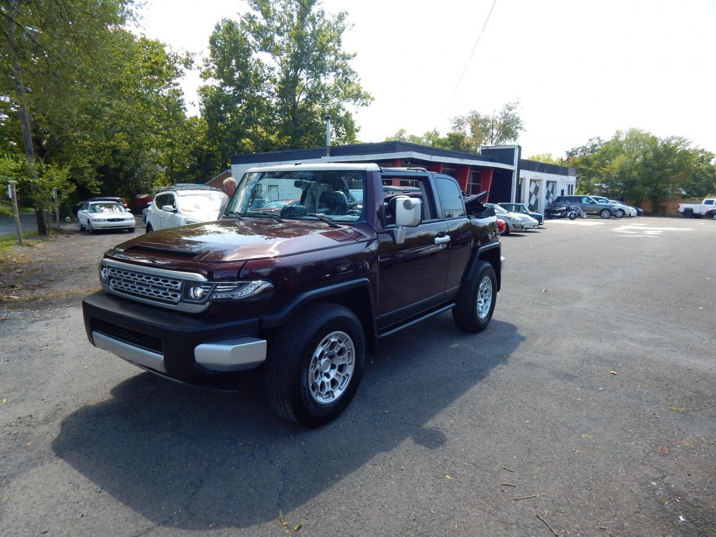 2007 Black Cherry Pearl /Black Cloth Toyota FJ Cruiser 4WD AT (JTEBU11FX70) with an 3.4L V6 DOHC 24V engine, 5-Speed Automatic Overdrive transmission, located at 6528 Lower York Road, New Hope, PA, 18938, (215) 862-9555, 40.358707, -74.977882 - 2007 Toyota F J Cruiser Convertible, only 38 of these were subtracted from Toyota, she is finished in Black Cherry Pearl paint, has black cloth seating. Powered by a 4.0 Liter V6 engine, automatic transmission and 4 wheel drive. Tilt wheel, cruise control, power windows, locks, 4 doors, Cold Air co - Photo#25