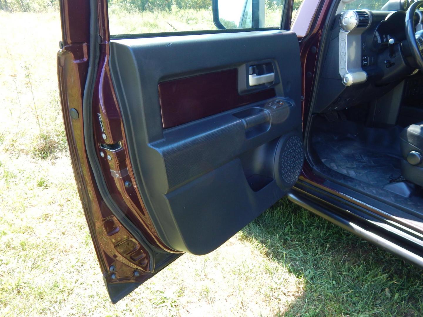 2007 Black Cherry Pearl /Black Cloth Toyota FJ Cruiser 4WD AT (JTEBU11FX70) with an 3.4L V6 DOHC 24V engine, 5-Speed Automatic Overdrive transmission, located at 6528 Lower York Road, New Hope, PA, 18938, (215) 862-9555, 40.358707, -74.977882 - 2007 Toyota F J Cruiser Convertible, only 38 of these were subtracted from Toyota, she is finished in Black Cherry Pearl paint, has black cloth seating. Powered by a 4.0 Liter V6 engine, automatic transmission and 4 wheel drive. Tilt wheel, cruise control, power windows, locks, 4 doors, Cold Air co - Photo#11