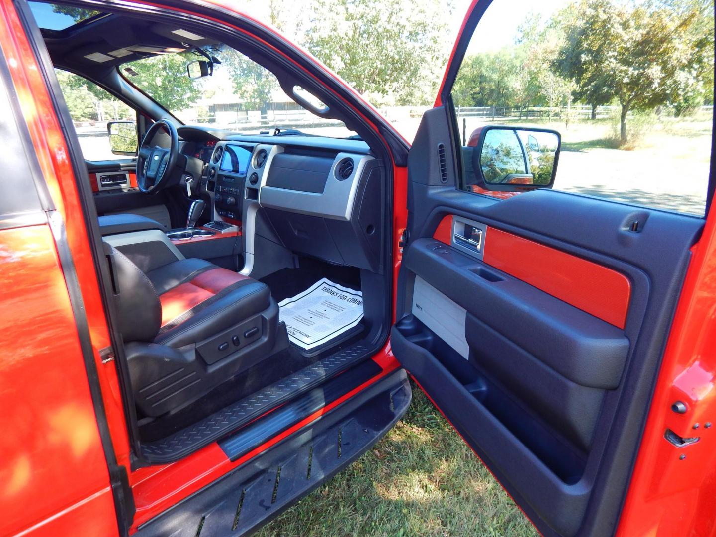 2011 Orange /Black/Red Leather Ford F-150 SVT Raptor SuperCab 5.5-ft. Bed 4WD (1FTEX1R64BF) with an 6.2L V8 SOHC 16V engine, 4-Speed Automatic transmission, located at 6528 Lower York Road, New Hope, PA, 18938, (215) 862-9555, 40.358707, -74.977882 - Here we have a very cool 2011 Ford F-150 SVT Raptor extended cab with a 6.2L V8 putting power to all 4 wheels via an automatic transmission with rear locking differential. Options include: black/red leather, dual power seats, dual climate controls, heated front seats, power sunroof, aftermarket radi - Photo#28