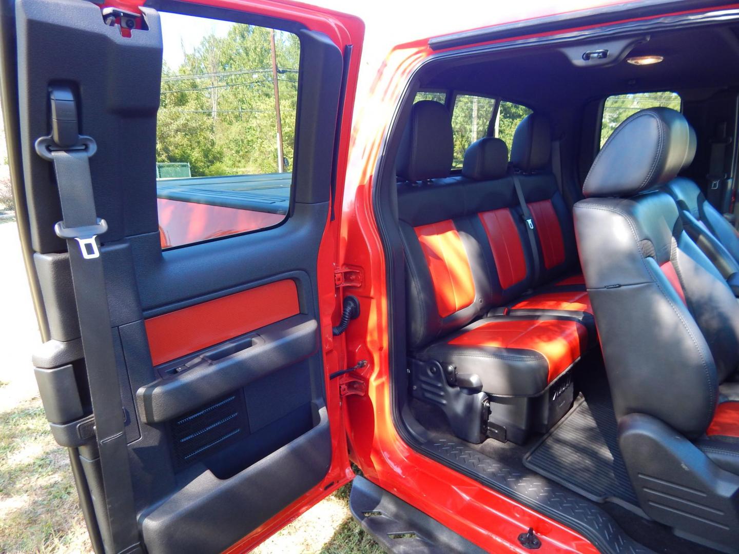 2011 Orange /Black/Red Leather Ford F-150 SVT Raptor SuperCab 5.5-ft. Bed 4WD (1FTEX1R64BF) with an 6.2L V8 SOHC 16V engine, 4-Speed Automatic transmission, located at 6528 Lower York Road, New Hope, PA, 18938, (215) 862-9555, 40.358707, -74.977882 - Here we have a very cool 2011 Ford F-150 SVT Raptor extended cab with a 6.2L V8 putting power to all 4 wheels via an automatic transmission with rear locking differential. Options include: black/red leather, dual power seats, dual climate controls, heated front seats, power sunroof, aftermarket radi - Photo#29