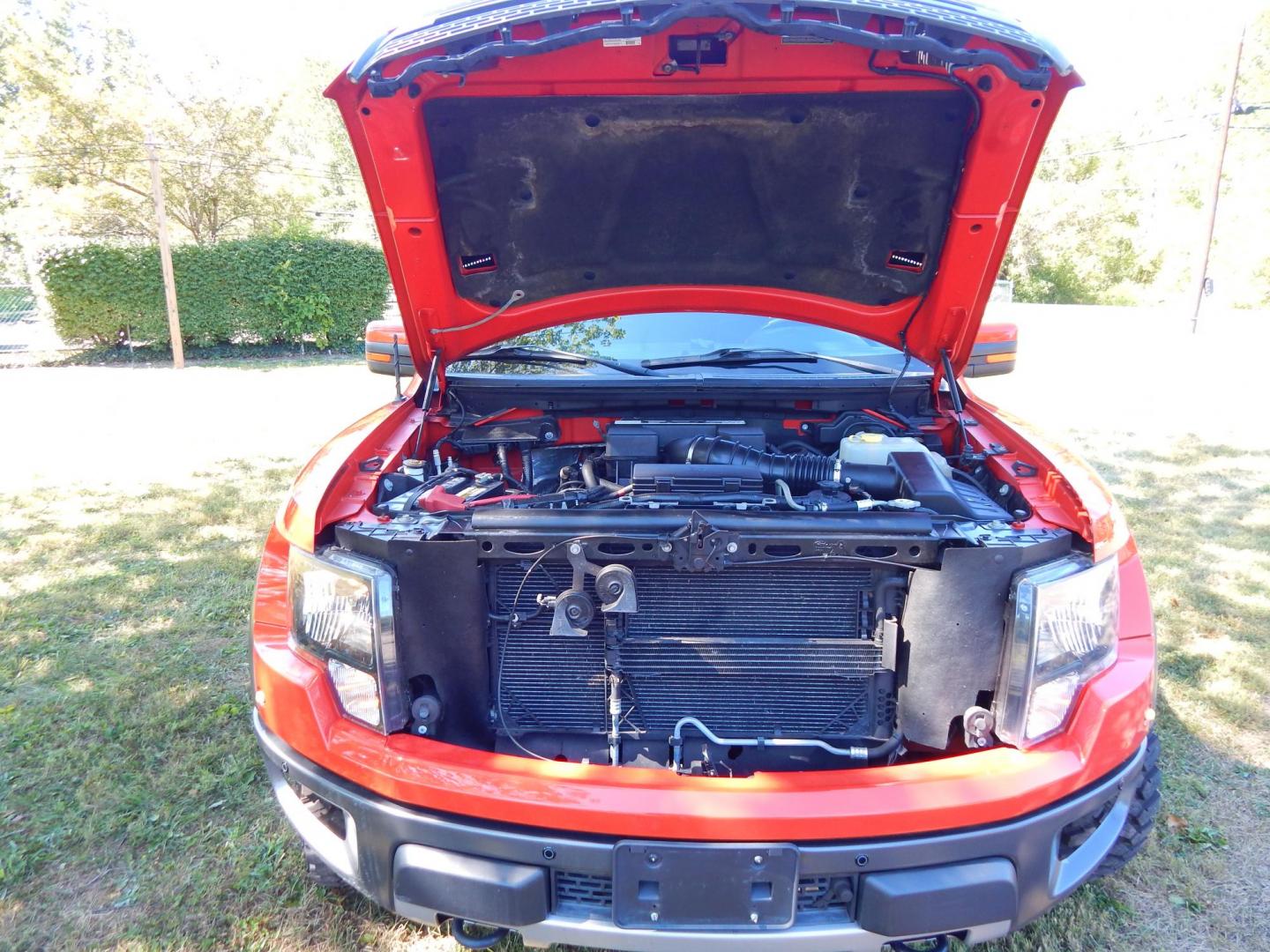 2011 Orange /Black/Red Leather Ford F-150 SVT Raptor SuperCab 5.5-ft. Bed 4WD (1FTEX1R64BF) with an 6.2L V8 SOHC 16V engine, 4-Speed Automatic transmission, located at 6528 Lower York Road, New Hope, PA, 18938, (215) 862-9555, 40.358707, -74.977882 - Here we have a very cool 2011 Ford F-150 SVT Raptor extended cab with a 6.2L V8 putting power to all 4 wheels via an automatic transmission with rear locking differential. Options include: black/red leather, dual power seats, dual climate controls, heated front seats, power sunroof, aftermarket radi - Photo#31