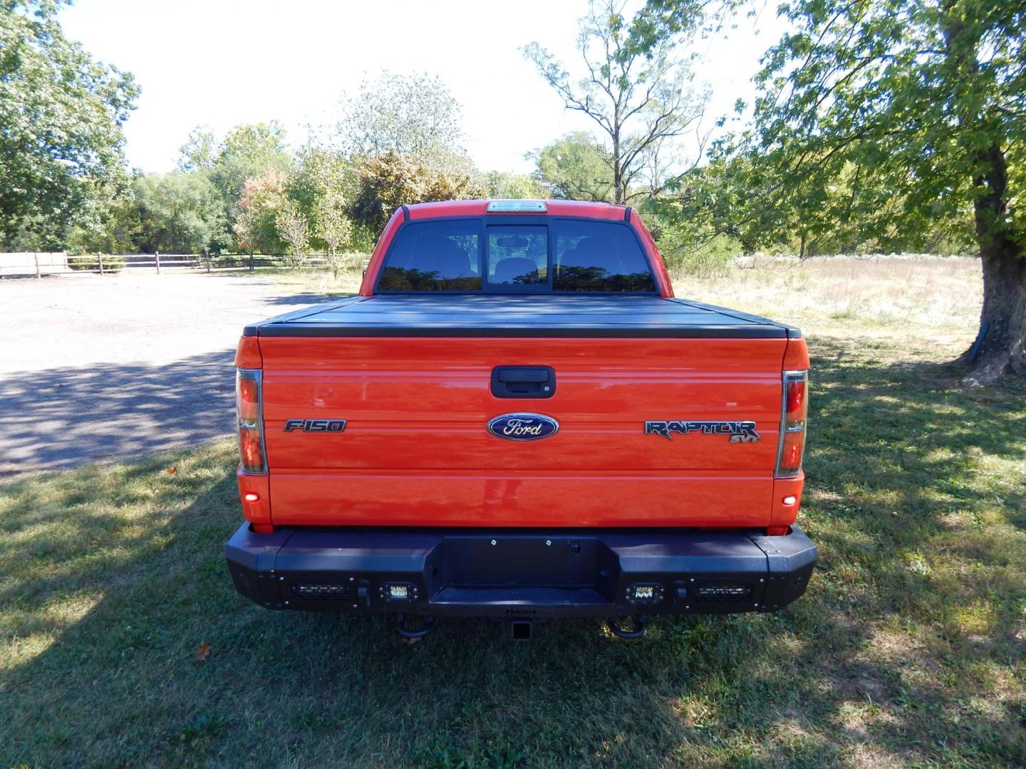 2011 Orange /Black/Red Leather Ford F-150 SVT Raptor SuperCab 5.5-ft. Bed 4WD (1FTEX1R64BF) with an 6.2L V8 SOHC 16V engine, 4-Speed Automatic transmission, located at 6528 Lower York Road, New Hope, PA, 18938, (215) 862-9555, 40.358707, -74.977882 - Here we have a very cool 2011 Ford F-150 SVT Raptor extended cab with a 6.2L V8 putting power to all 4 wheels via an automatic transmission with rear locking differential. Options include: black/red leather, dual power seats, dual climate controls, heated front seats, power sunroof, aftermarket radi - Photo#4