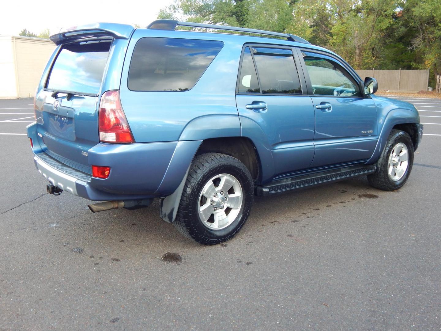 2004 Blue /Gray Cloth Toyota 4Runner Sport Edition 4WD (JTEBU14R340) with an 4.0L V6 DOHC 24V engine, Automatic transmission, located at 6528 Lower York Road, New Hope, PA, 18938, (215) 862-9555, 40.358707, -74.977882 - Here we have a 2004 Toyota 4 runner with a 4.0L V6 putting power to a 4x4 automatic transmission. Options include: gray cloth, A/C, heat, AM/FM/CD/TAPE radio, rear sliding glass, sunroof, cruise control, power windows/locks/mirrors, JBL speakers, tilt steering wheel, roof rack, running boards, tow h - Photo#4