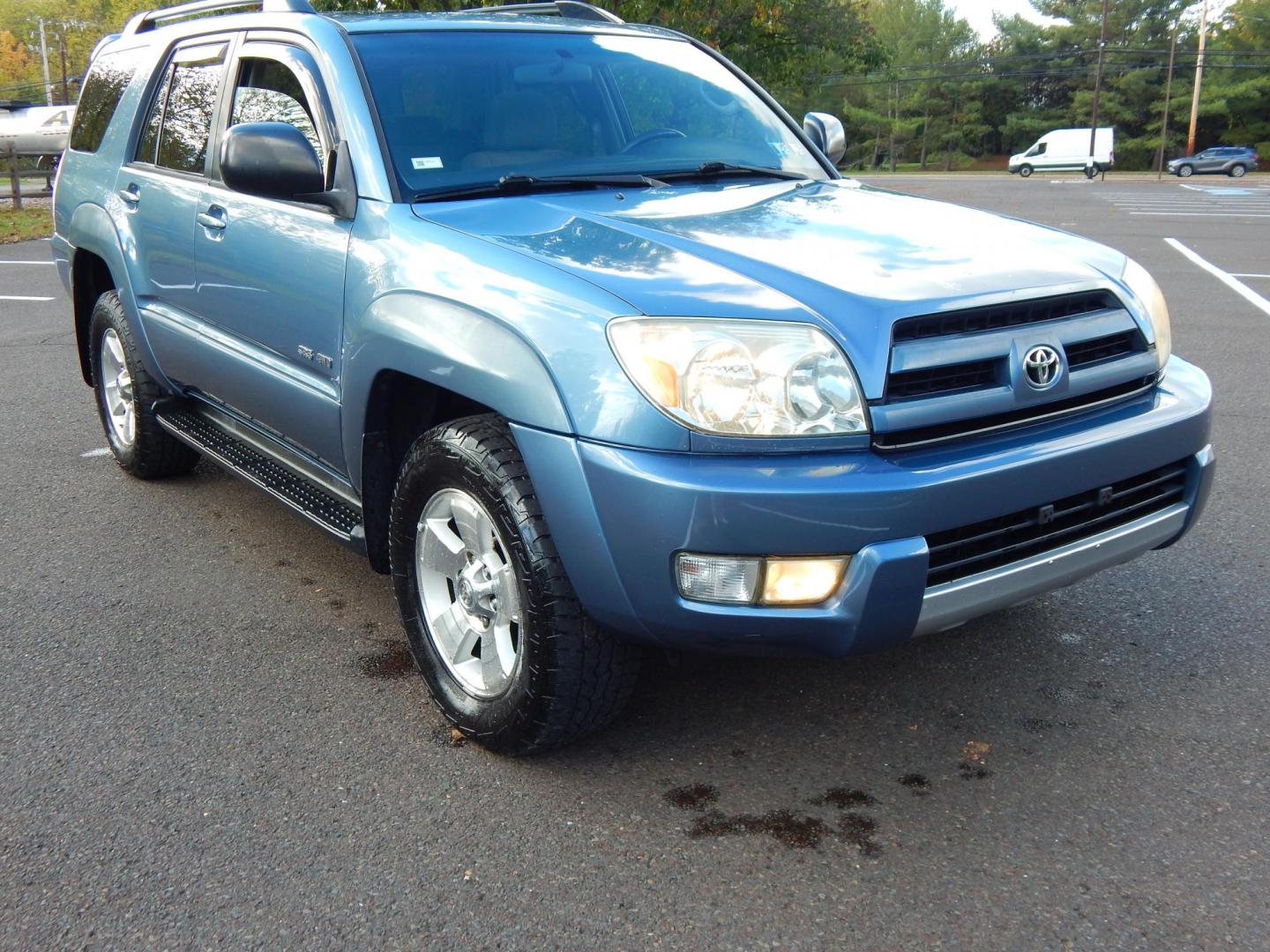 2004 Blue /Gray Cloth Toyota 4Runner Sport Edition 4WD (JTEBU14R340) with an 4.0L V6 DOHC 24V engine, Automatic transmission, located at 6528 Lower York Road, New Hope, PA, 18938, (215) 862-9555, 40.358707, -74.977882 - Here we have a 2004 Toyota 4 runner with a 4.0L V6 putting power to a 4x4 automatic transmission. Options include: gray cloth, A/C, heat, AM/FM/CD/TAPE radio, rear sliding glass, sunroof, cruise control, power windows/locks/mirrors, JBL speakers, tilt steering wheel, roof rack, running boards, tow h - Photo#5