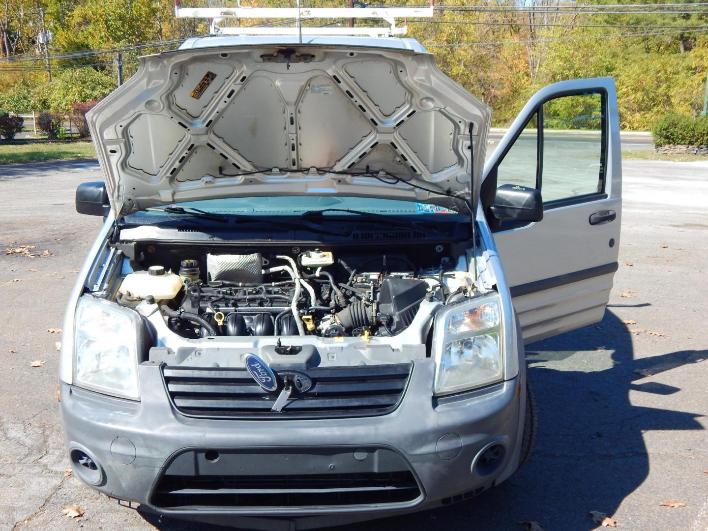 2013 Silver /Gray Cloth Ford Transit Connect XL (NM0LS6AN3DT) with an 2.0L L4 DOHC 16V engine, 4-Speed Automatic transmission, located at 6528 Lower York Road, New Hope, PA, 18938, (215) 862-9555, 40.358707, -74.977882 - Here we have a 2013 Transit Connect XL with a 2.0L 4 cylinder engine putting power to the front wheels via a smooth shifting automatic transmission. Options include: gray cloth, heat and A/C, AM/FM/CD/AUX radio, roll up windows, front defrost, separating rear wall, 2 sliding side doors with glass, 2 - Photo#24