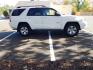 2004 White /Gray Cloth Toyota 4Runner Sport Edition 4WD (JTEBU14R440) with an 4.0L V6 DOHC 24V engine, Automatic transmission, located at 6528 Lower York Road, New Hope, PA, 18938, (215) 862-9555, 40.358707, -74.977882 - Here we have a Toyota 4 Runner with a 4.0L V6 putting power to a 4x4 automatic transmission. Options include: gray cloth, sun roof, rear power lowering window, AC/heat, cruise control, tilt steering wheel, power windows/locks/mirrors, AM/FM/CD/TAPE radio, 17 inch alloy wheels, fog lights, roof rack, - Photo#4