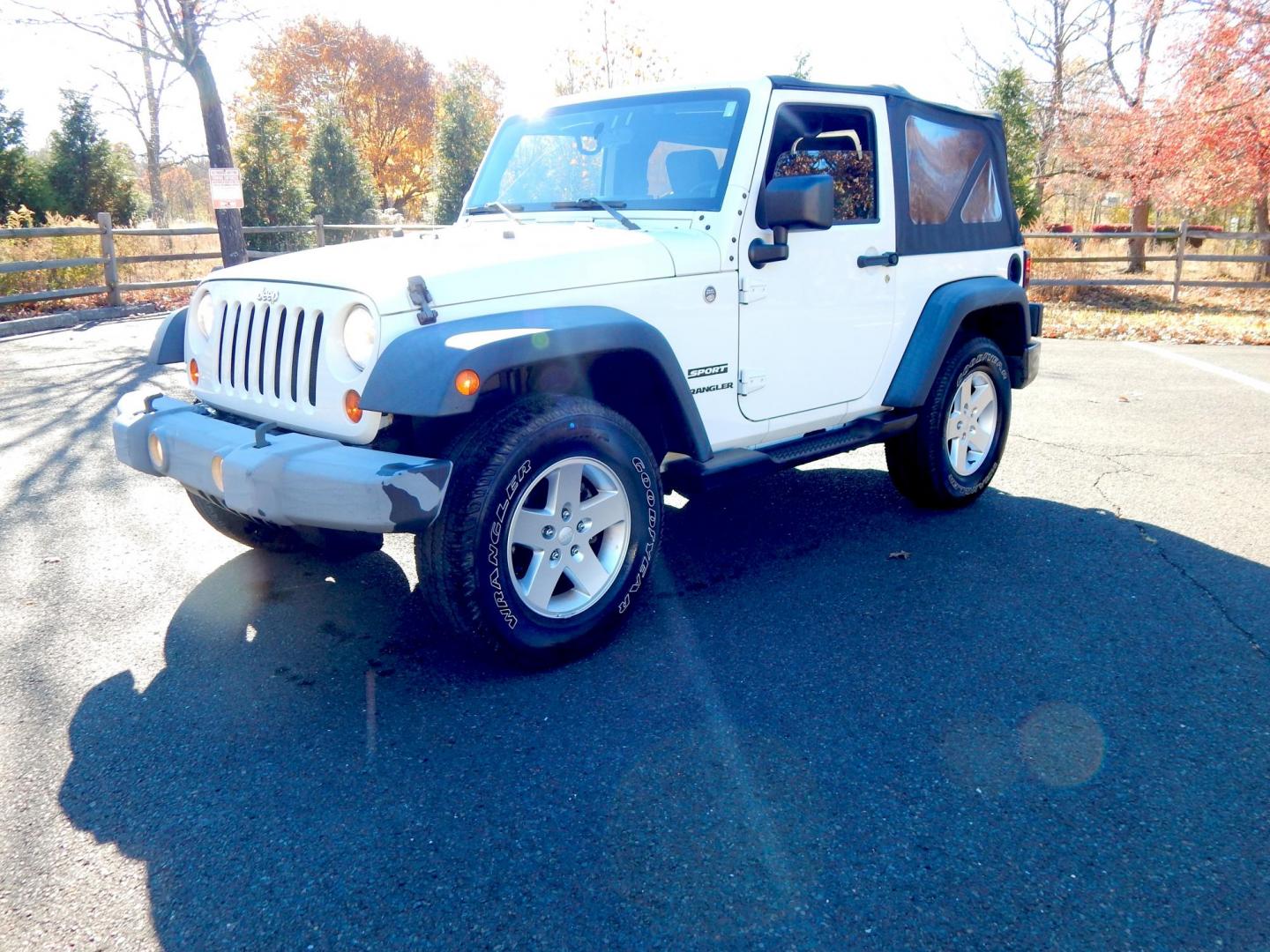 2010 White /Gray Cloth Jeep Wrangler Sport 4WD (1J4AA2D19AL) with an 3.8L V6 OHV 12V engine, Automatic transmission, located at 6528 Lower York Road, New Hope, PA, 18938, (215) 862-9555, 40.358707, -74.977882 - Here we have a very low millage Wrangler Sport with a 3.8L V6 putting power to a 4x4 automatic transmission. Options include: gray cloth, AC/HEAT, Pioneer head unit with bluetooth, soft top, tilt steering wheel, cruise control, aftermarket remote start, power windows, power locks, fog lights, tow hi - Photo#0