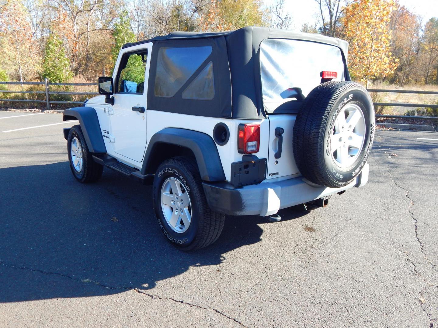 2010 White /Gray Cloth Jeep Wrangler Sport 4WD (1J4AA2D19AL) with an 3.8L V6 OHV 12V engine, Automatic transmission, located at 6528 Lower York Road, New Hope, PA, 18938, (215) 862-9555, 40.358707, -74.977882 - Here we have a very low millage Wrangler Sport with a 3.8L V6 putting power to a 4x4 automatic transmission. Options include: gray cloth, AC/HEAT, Pioneer head unit with bluetooth, soft top, tilt steering wheel, cruise control, aftermarket remote start, power windows, power locks, fog lights, tow hi - Photo#3