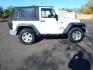 2010 White /Gray Cloth Jeep Wrangler Sport 4WD (1J4AA2D19AL) with an 3.8L V6 OHV 12V engine, Automatic transmission, located at 6528 Lower York Road, New Hope, PA, 18938, (215) 862-9555, 40.358707, -74.977882 - Here we have a very low millage Wrangler Sport with a 3.8L V6 putting power to a 4x4 automatic transmission. Options include: gray cloth, AC/HEAT, Pioneer head unit with bluetooth, soft top, tilt steering wheel, cruise control, aftermarket remote start, power windows, power locks, fog lights, tow hi - Photo#4