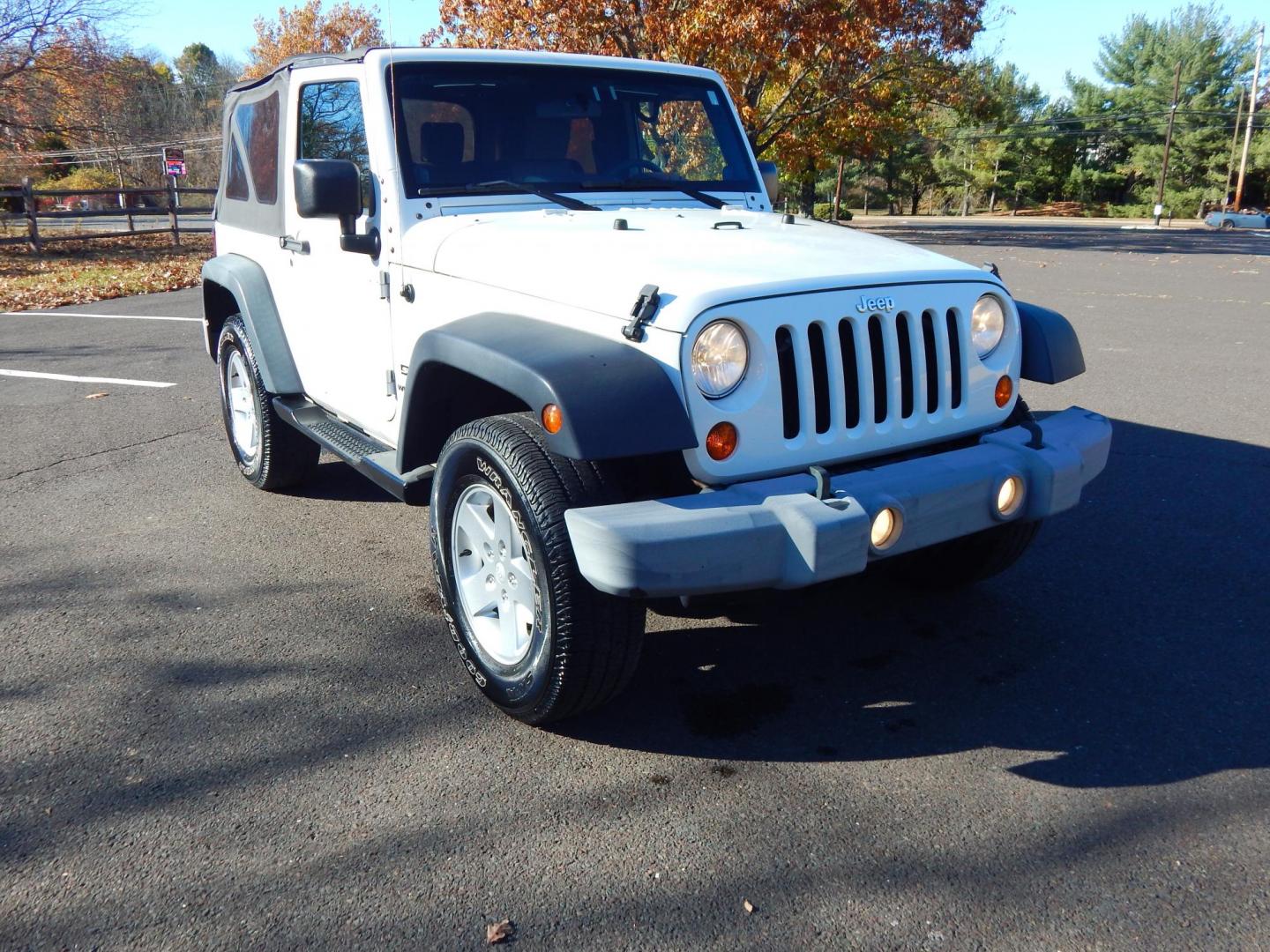 2010 White /Gray Cloth Jeep Wrangler Sport 4WD (1J4AA2D19AL) with an 3.8L V6 OHV 12V engine, Automatic transmission, located at 6528 Lower York Road, New Hope, PA, 18938, (215) 862-9555, 40.358707, -74.977882 - Here we have a very low millage Wrangler Sport with a 3.8L V6 putting power to a 4x4 automatic transmission. Options include: gray cloth, AC/HEAT, Pioneer head unit with bluetooth, soft top, tilt steering wheel, cruise control, aftermarket remote start, power windows, power locks, fog lights, tow hi - Photo#6