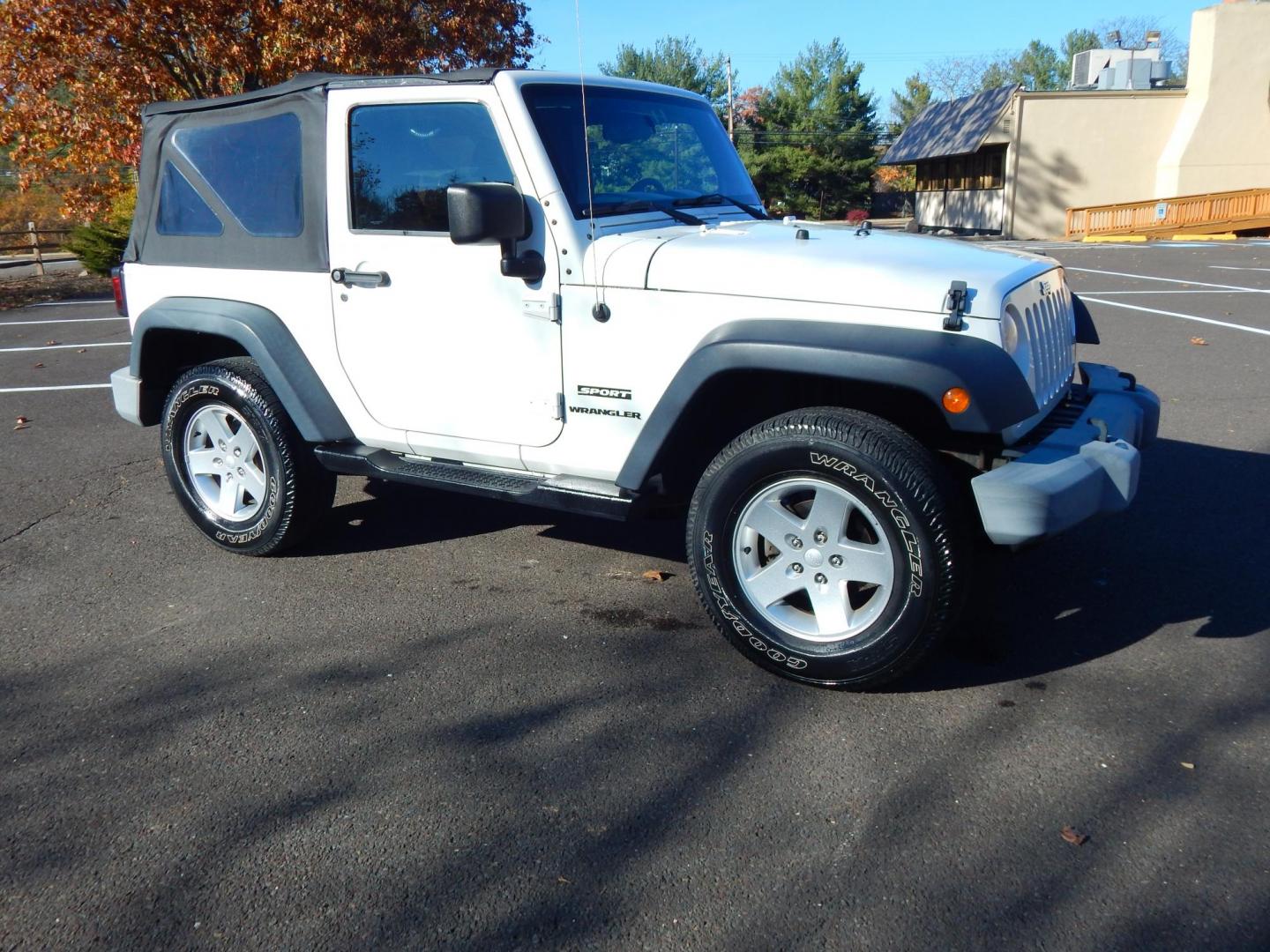 2010 White /Gray Cloth Jeep Wrangler Sport 4WD (1J4AA2D19AL) with an 3.8L V6 OHV 12V engine, Automatic transmission, located at 6528 Lower York Road, New Hope, PA, 18938, (215) 862-9555, 40.358707, -74.977882 - Here we have a very low millage Wrangler Sport with a 3.8L V6 putting power to a 4x4 automatic transmission. Options include: gray cloth, AC/HEAT, Pioneer head unit with bluetooth, soft top, tilt steering wheel, cruise control, aftermarket remote start, power windows, power locks, fog lights, tow hi - Photo#7