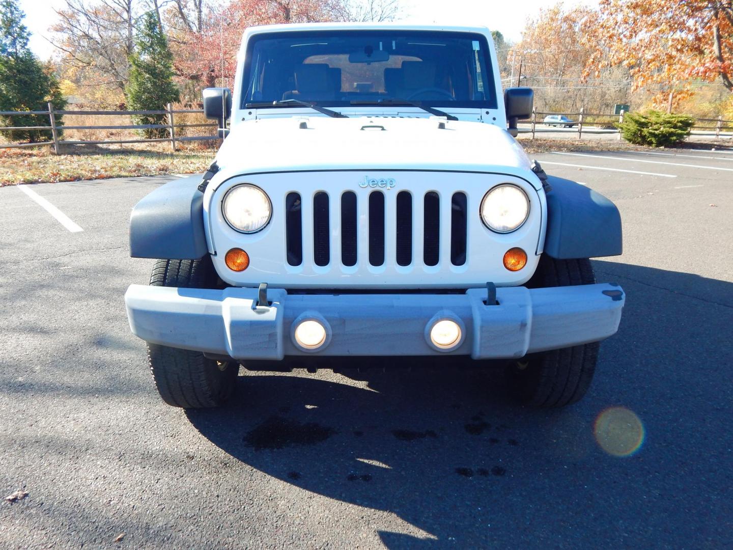 2010 White /Gray Cloth Jeep Wrangler Sport 4WD (1J4AA2D19AL) with an 3.8L V6 OHV 12V engine, Automatic transmission, located at 6528 Lower York Road, New Hope, PA, 18938, (215) 862-9555, 40.358707, -74.977882 - Here we have a very low millage Wrangler Sport with a 3.8L V6 putting power to a 4x4 automatic transmission. Options include: gray cloth, AC/HEAT, Pioneer head unit with bluetooth, soft top, tilt steering wheel, cruise control, aftermarket remote start, power windows, power locks, fog lights, tow hi - Photo#8