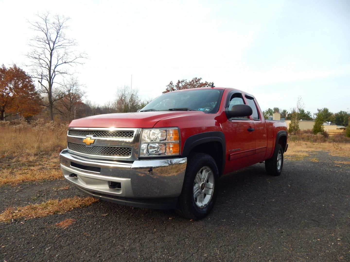 2013 RED /Black Cloth Chevrolet Silverado 1500 LT Ext. Cab Long Box 4WD (1GCRKSE78DZ) with an 5.3L V8 OHV 16V FFV engine, 6-Speed Automatic transmission, located at 6528 Lower York Road, New Hope, PA, 18938, (215) 862-9555, 40.358707, -74.977882 - Here we have a very nice Chevy Silverado with a 5.3L V8 putting power to a 4x4 automatic transmission. Options include: black cloth, dual climate controls, AM/FM/CD/AUX radio, cruise control, tilt steering wheel, automatic headlights, power windows, power locks, power mirrors, 18 inch alloy wheels a - Photo#0