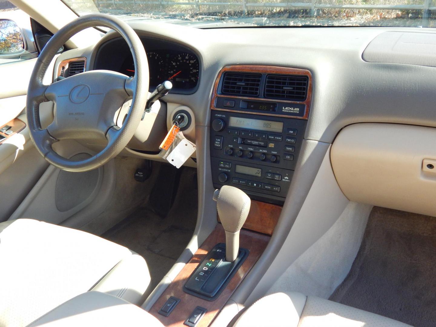 1999 Gold /Tan Leather Lexus ES 300 Base (JT8BF28G7X5) with an 3.0L V6 DOHC 24V engine, 4-Speed Automatic Overdrive transmission, located at 6528 Lower York Road, New Hope, PA, 18938, (215) 862-9555, 40.358707, -74.977882 - Here we have a very nice Lexus ES300 with a 3.0L V6 putting power to the front wheels via a smooth shifting automatic. Options include: tan leather, heat, A/C, power sunroof, AM/FM/CD/TAPE radio, cruise control, tilt steering wheel, automatic headlights, power windows/locks/mirrors, Lexus Premium So - Photo#12