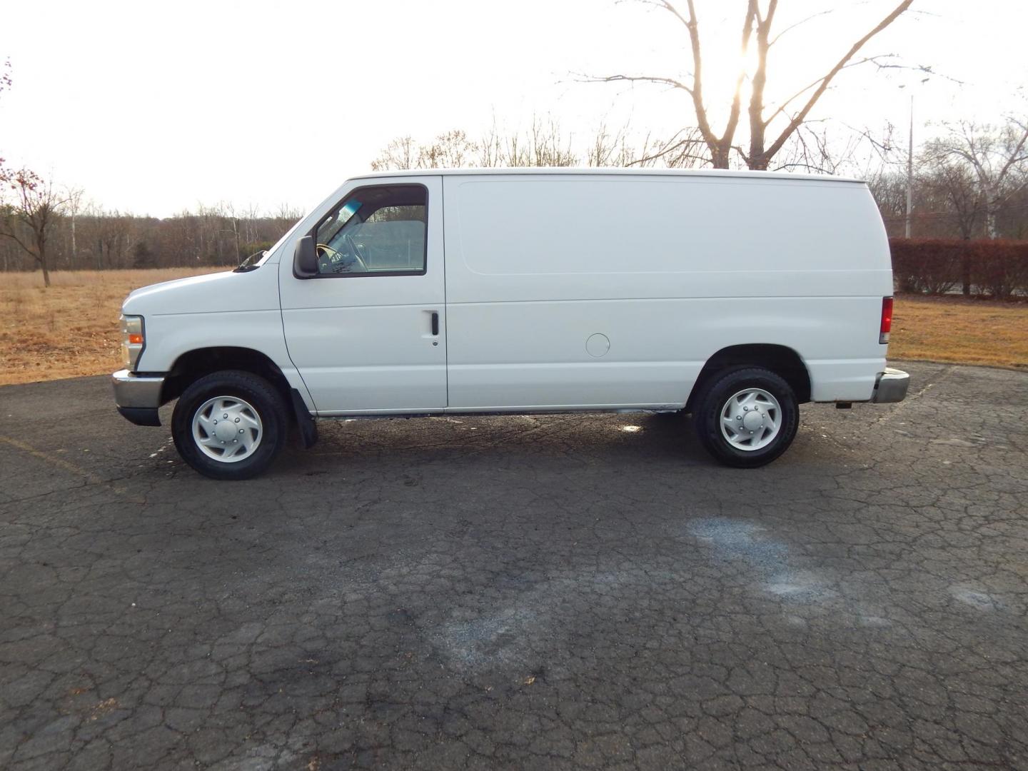 2008 White /Gray Leather Ford E-Series Van E-150 (1FTNE14W18D) with an 4.6L V8 SOHC 16V engine, 4-Speed Automatic Overdrive transmission, located at 6528 Lower York Road, New Hope, PA, 18938, (215) 862-9555, 40.358707, -74.977882 - Here we have a low mileage, 2008 Ford E-150 cargo van with a 4.6L V8 putting power to the rear wheels via an automatic transmission. Options include: gray leather, AM/FM radio, A/C, heat, cruise control, tilt steering wheel, power windows/locks/mirrors, 2 sets of keys, 16 inch wheels with 4 Nexen Ro - Photo#1