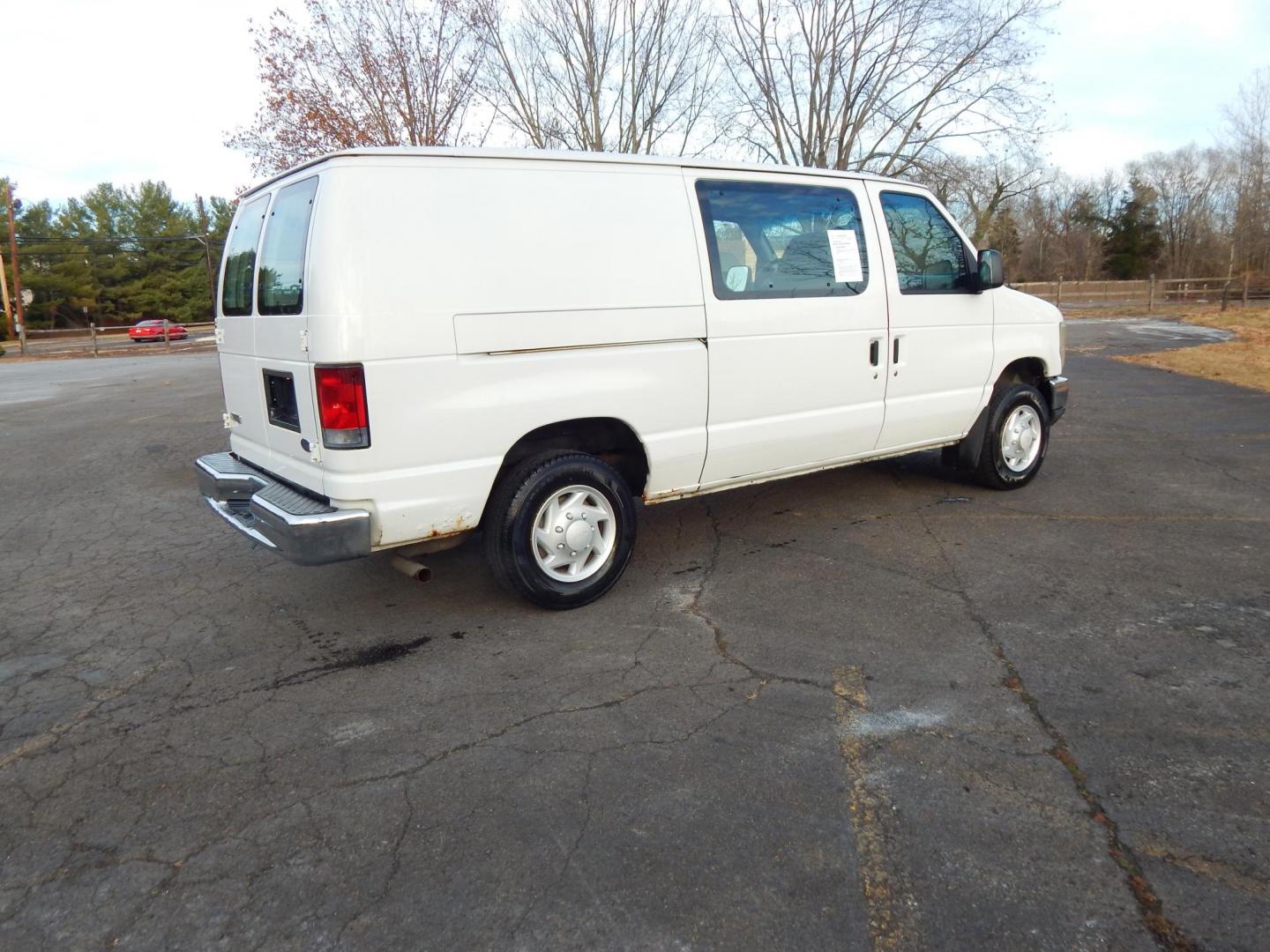 2008 White /Gray Leather Ford E-Series Van E-150 (1FTNE14W18D) with an 4.6L V8 SOHC 16V engine, 4-Speed Automatic Overdrive transmission, located at 6528 Lower York Road, New Hope, PA, 18938, (215) 862-9555, 40.358707, -74.977882 - Here we have a low mileage, 2008 Ford E-150 cargo van with a 4.6L V8 putting power to the rear wheels via an automatic transmission. Options include: gray leather, AM/FM radio, A/C, heat, cruise control, tilt steering wheel, power windows/locks/mirrors, 2 sets of keys, 16 inch wheels with 4 Nexen Ro - Photo#4