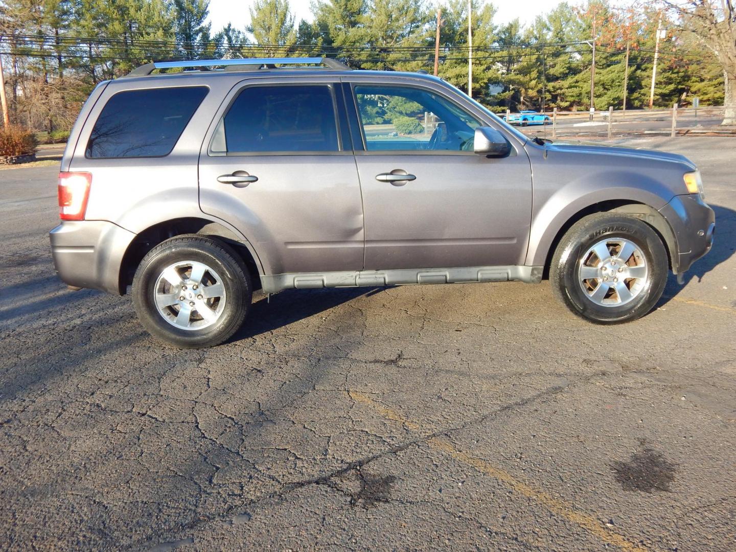 2012 Gray /Black Leather Ford Escape Limited 4WD (1FMCU9EG8CK) with an 3.0L V6 DOHC 24V engine, 6-Speed Automatic transmission, located at 6528 Lower York Road, New Hope, PA, 18938, (215) 862-9555, 40.358707, -74.977882 - Here we have a Ford Escape Limited with a 3.0L V6 putting power to an all wheel drive automatic transmission. Options include: black leather, power drivers seat, heated front seats, dual climate, AM/FM/CD/AUX/SIRIUS radio, cruise control, sunroof, automatic headlights, power windows/locks/mirrors, r - Photo#5