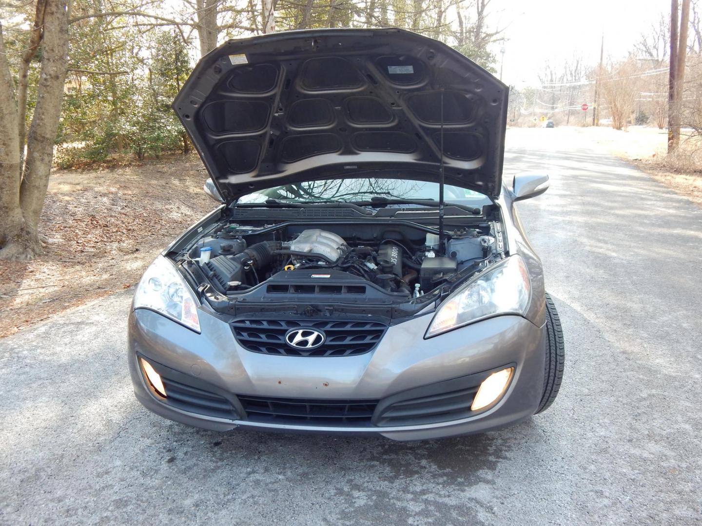 2010 Gray /Black Leather Hyundai Genesis Coupe 3.8 Auto (KMHHU6KHXAU) with an 3.8L V6 DOHC 24V engine, 6-Speed Automatic transmission, located at 6528 Lower York Road, New Hope, PA, 18938, (215) 862-9555, 40.358707, -74.977882 - Here we have a very fun driving Hyundai Genesis coupe track edition with a 3.8L V6 putting power to the rear wheels via a smooth shifting automatic transmission. Options include: black leather, keyless entry, heated front seats, A/C, heat, AM/FM/CD/XM/AUX radio, cruise control, sunroof, tilt steerin - Photo#20